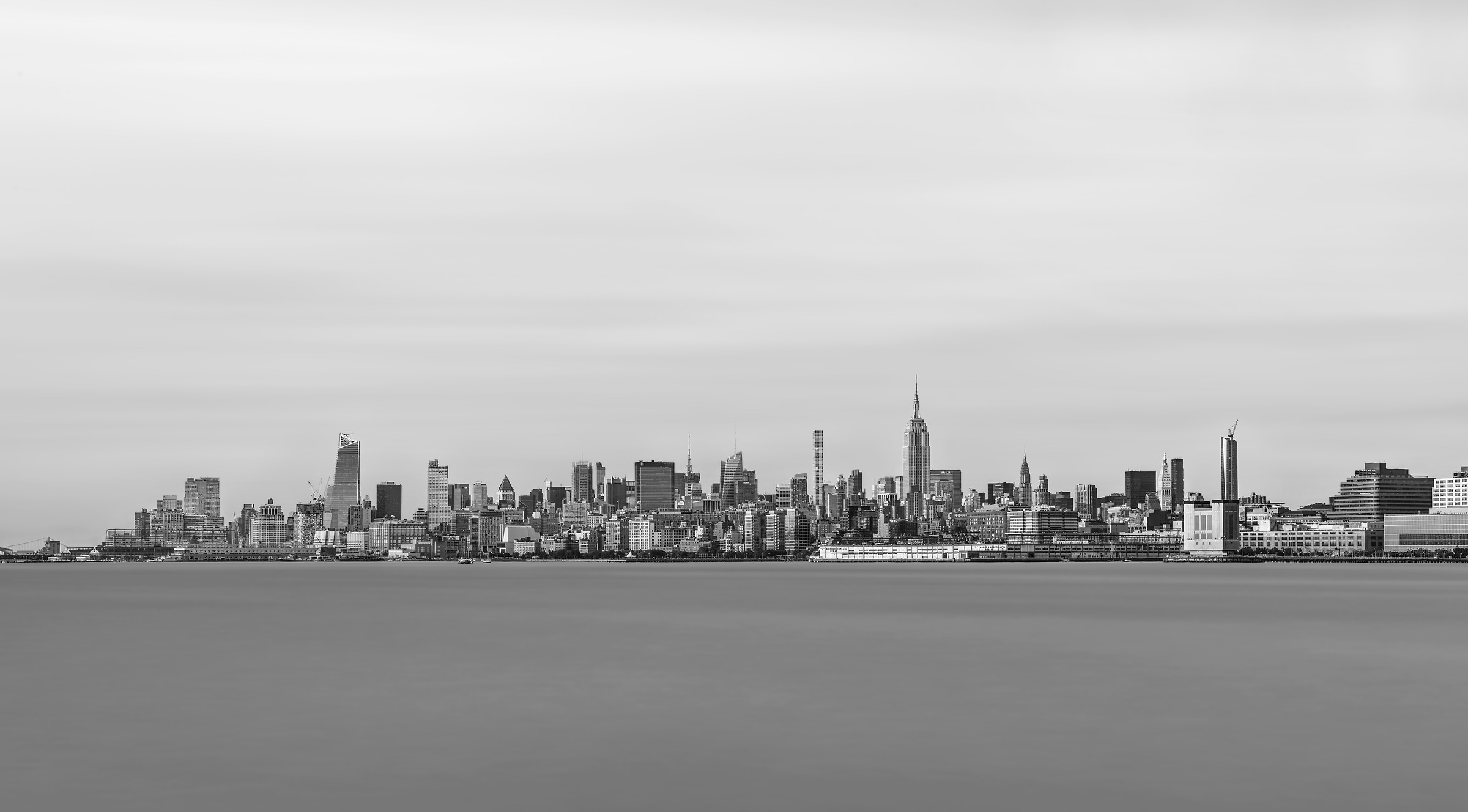 2,360 megapixels! A very high defintion long exposure cityscape VAST photo of the Midtown Manhattan New York City skyline and the Hudson River in black and white; created by Dan Piech.