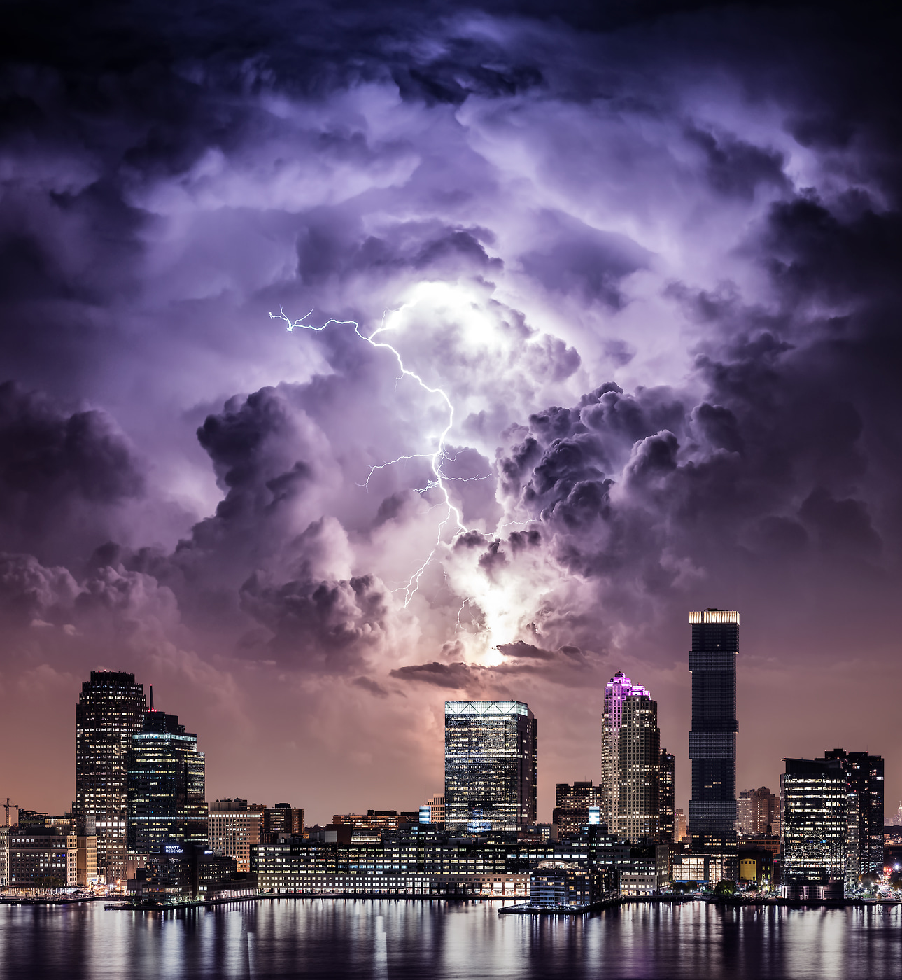 1,217 megapixels! A very high resolution, large-format VAST photo print of a lightning bolt strike from a thunderstorm in Jersey City, NJ over URL Harborside 1; created by Dan Piech.