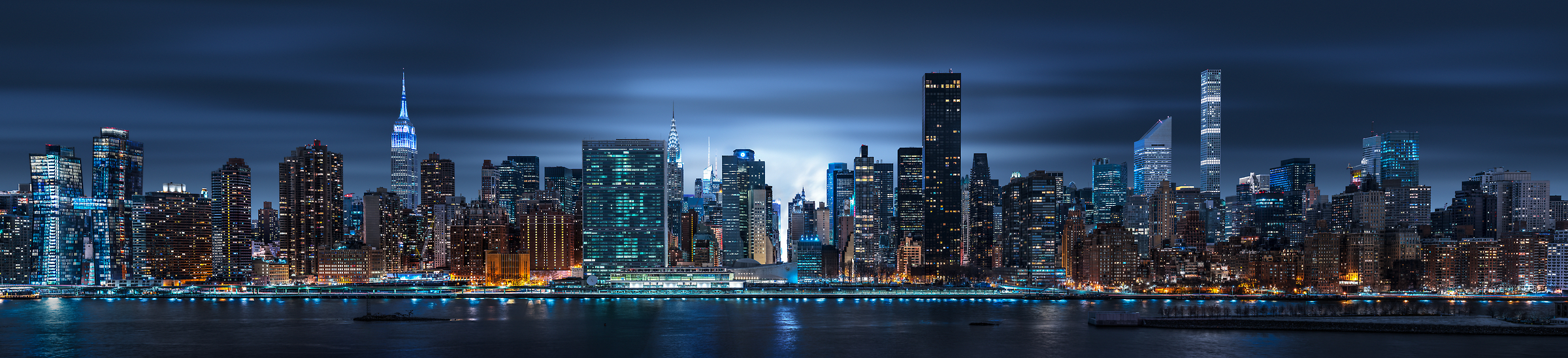 6,410 megapixels! A very high resolution, large-format VAST photo print of the NYC skyline at night with the East River; cityscape photo created by Dan Piech.