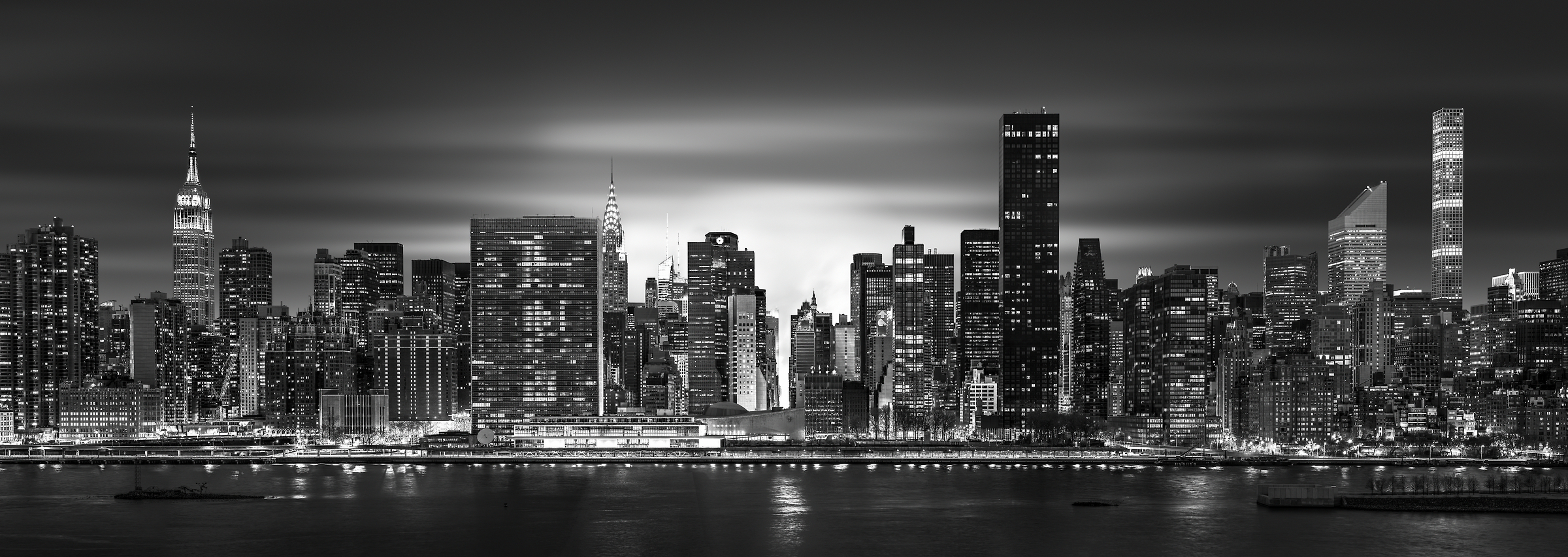4,122 megapixels! A very high resolution, large-format VAST photo print of the NYC skyline at night with the East River; cityscape photo created by Dan Piech.