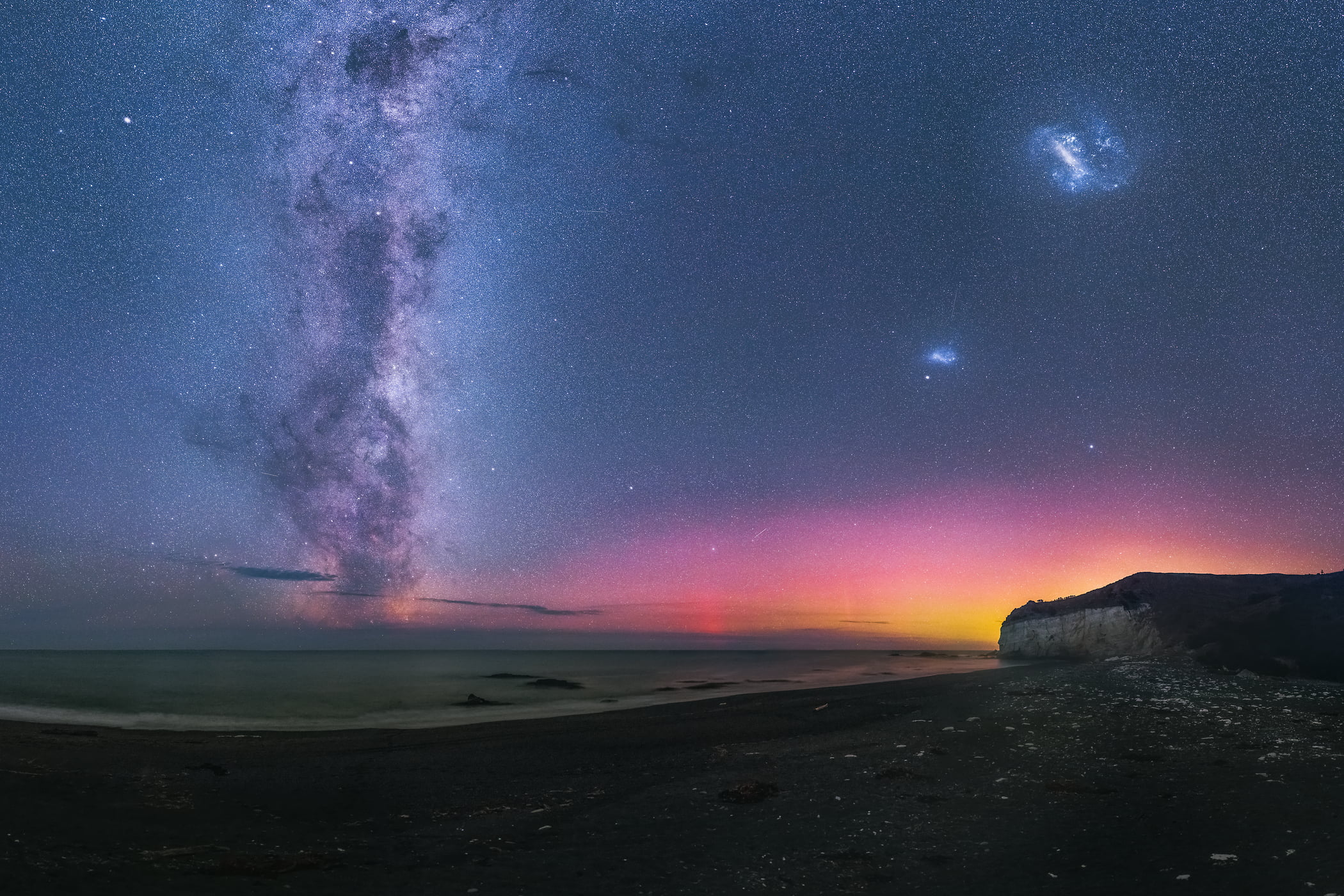 261 megapixels! A very high resolution, large-format VAST photo print of the night sky, milky way, and stars over the ocean and a beach; fine art astrophotography landscape photo created by Paul Wilson in Nape Nape, New Zealand.