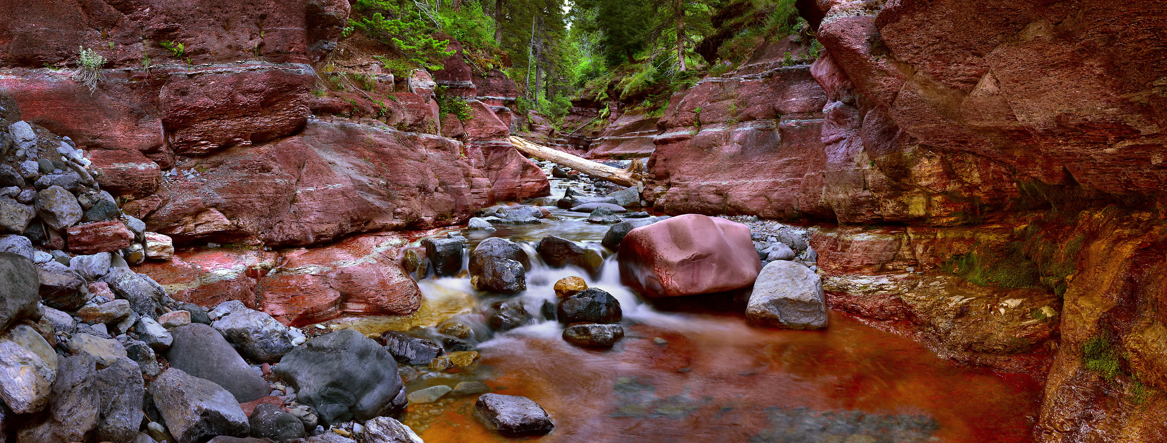 4,741 megapixels! A very high resolution, large-format VAST photo print of a stream, waterfall, and red rocks; fine art nature photo created by Steve Webster in Red Rock Canyon, Waterton Lakes National Park, Alberta Canada.
