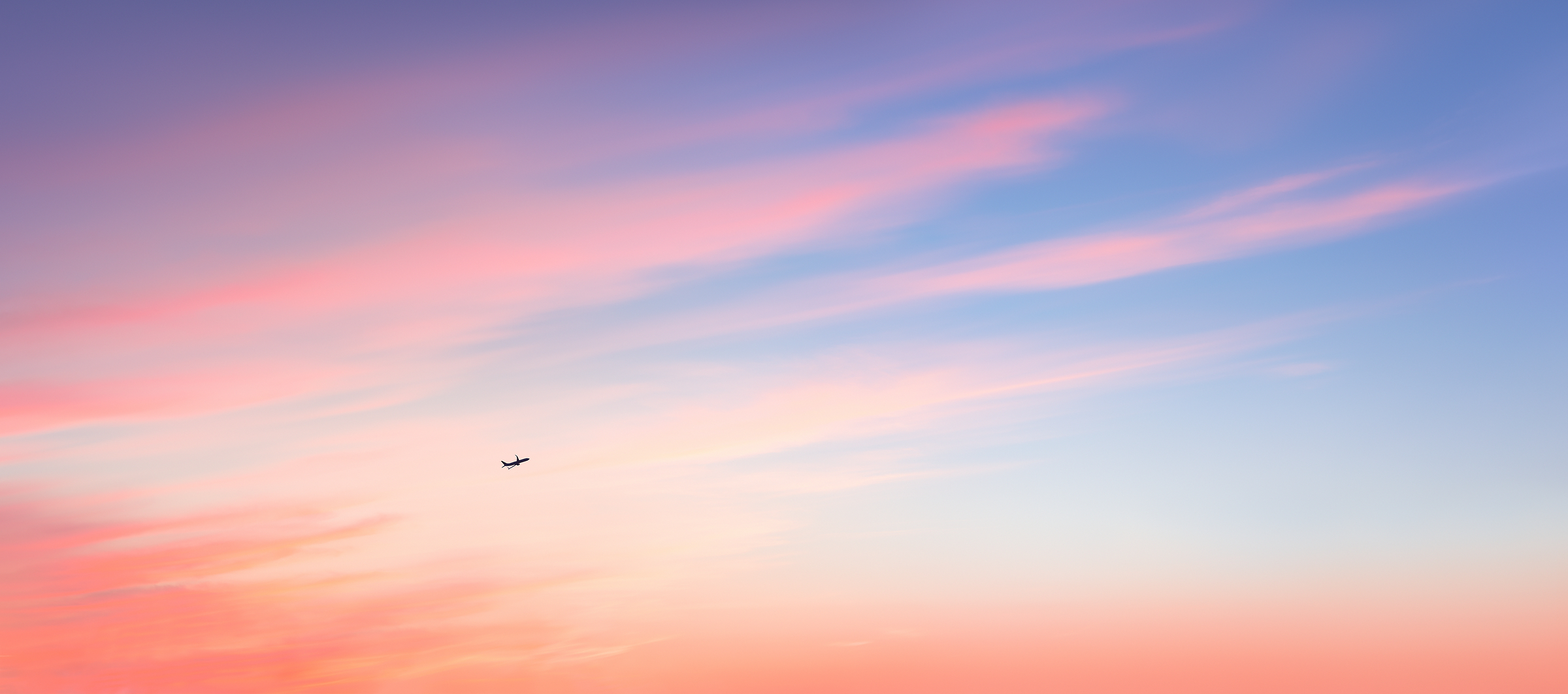403 megapixels! A very high resolution, large-format VAST photo of an airplane taking off into a vibrant colorful sunset; fine art aviation photograph created by Dan Piech in New York City.