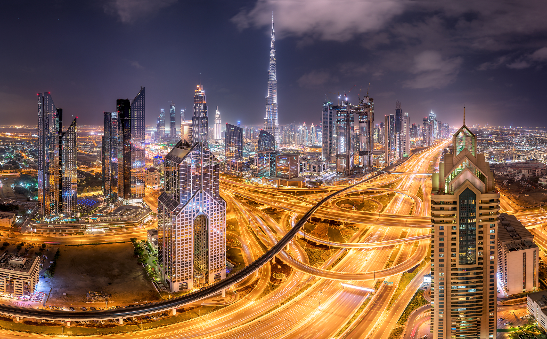 505 megapixels! A very high resolution, large-format VAST photo of the Dubai skyline and roads at night with the Burj Khalifa; fine art cityscape photograph created by Tim Shields in the United Arab Emirates.