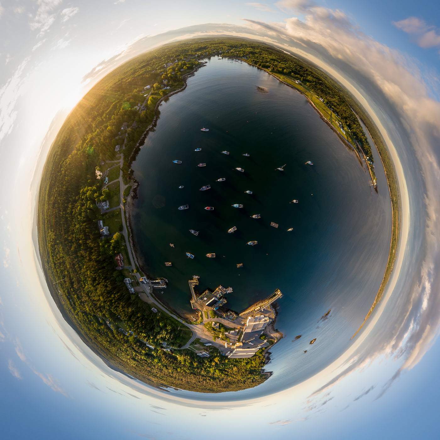 133 megapixels! A very high resolution, large-format artistic 360-degree spherical photo of a New England harbor with boats at sunset; abstract fine art photograph created by Aaron Priest in Prospect Harbor, Maine.