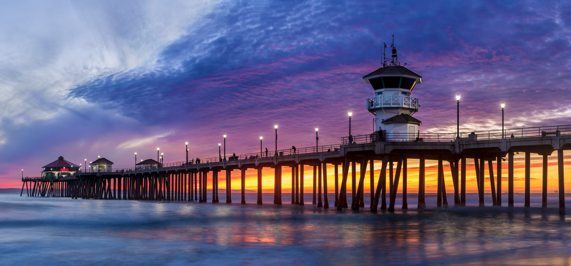 130 megapixels! A very high resolution, large-format VAST photo of the Huntington Beach Pier at sunset; created by Jim Tarpo in Huntington Beach, California.