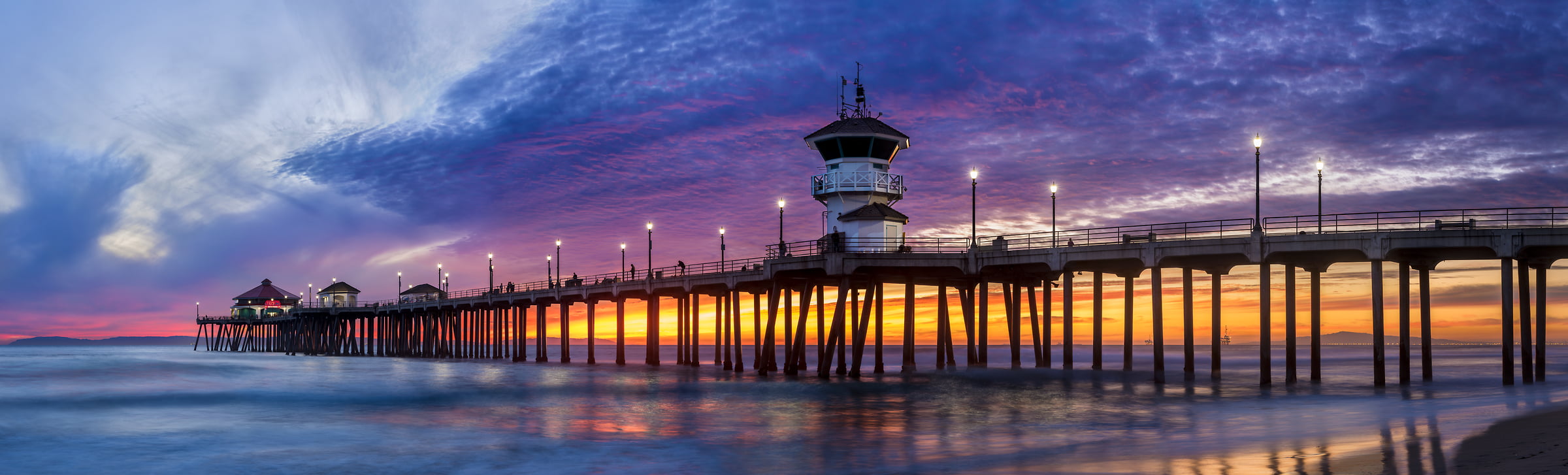 201 megapixels! A very high resolution, large-format VAST photo of a pier and the ocean at sunset; fine art photograph created by Jim Tarpo in Huntington Beach, California.