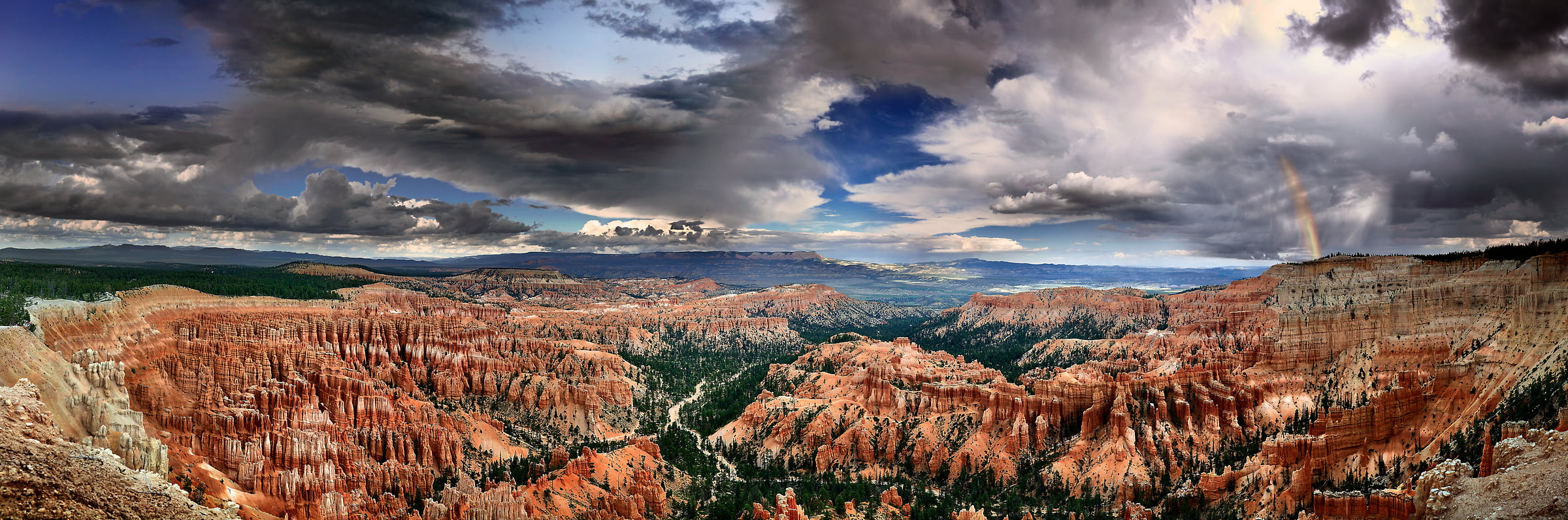 402 megapixels! A very high resolution panorama landscape photo of Bryce Canyon National Park with a rainbow; VAST photo created by Phil Crawshay in Bryce Canyon, Utah.