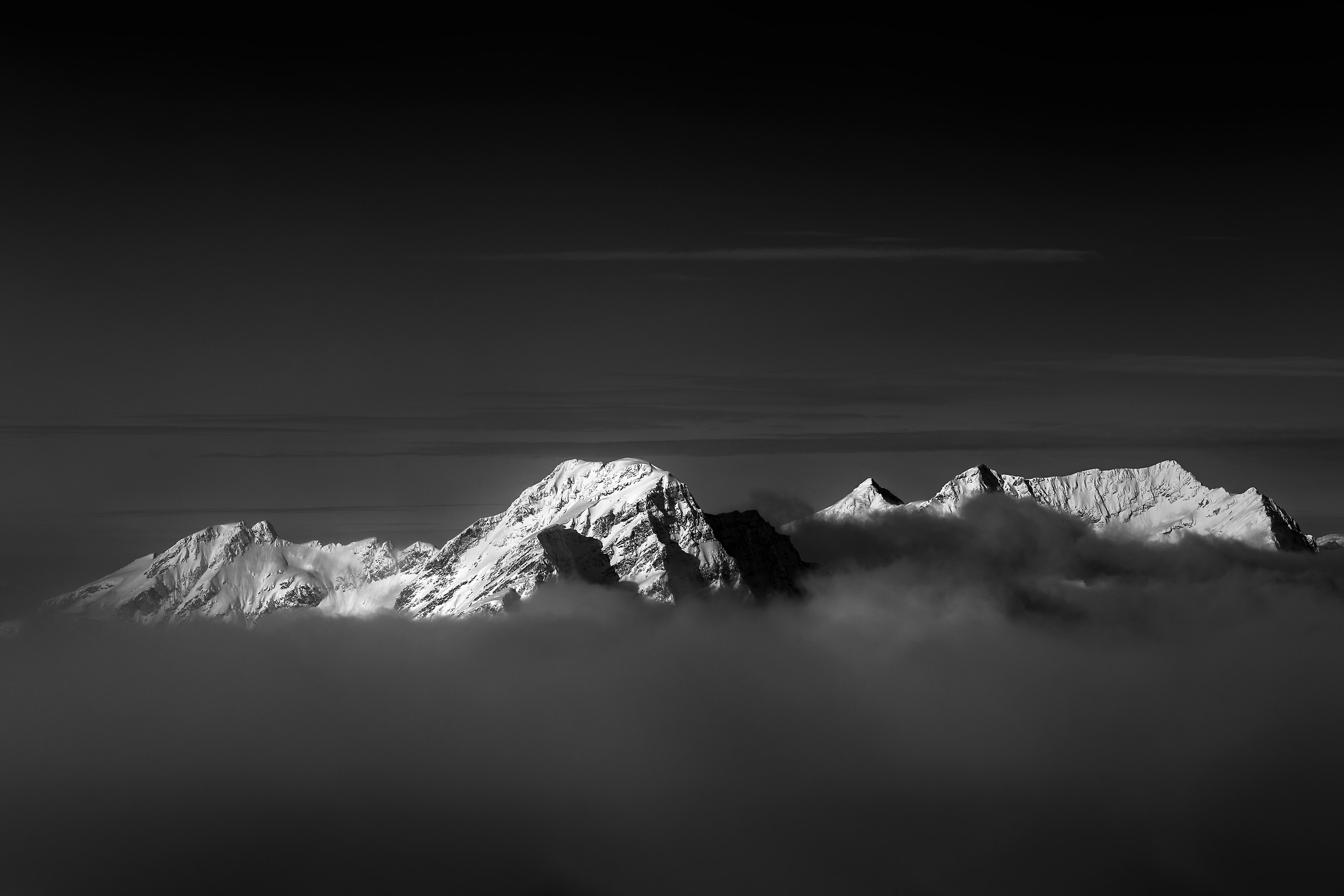 101 megapixels! A very high resolution, large-format VAST photo print of a mountain above the clouds; black and white landscape photograph created by Scott Rinckenberger in Davis Peak, Columbia Mountains, British Columbia, Canada.