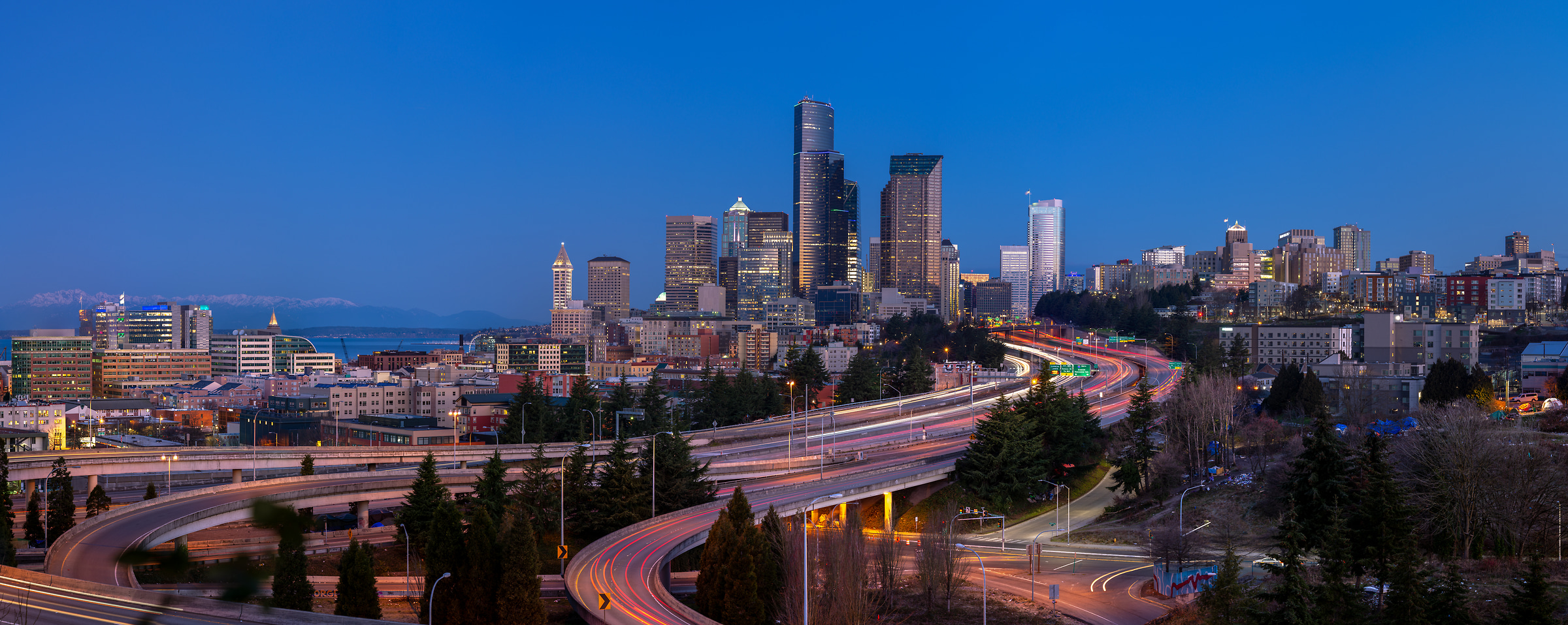 253 megapixels! A very high resolution, large-format VAST photo print of the Seattle skyline in the morning with highways in the foreground; photograph created by Greg Probst in Seattle, Washington.