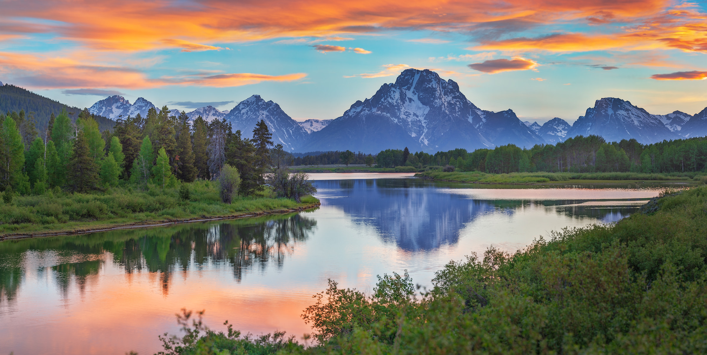 101 megapixels! A very high resolution, large-format VAST photo print of a sunset landscape with mountains, a river, and trees; photograph created by John Freeman in Oxbow Bend, Grand Tetons National Park, Wyoming.