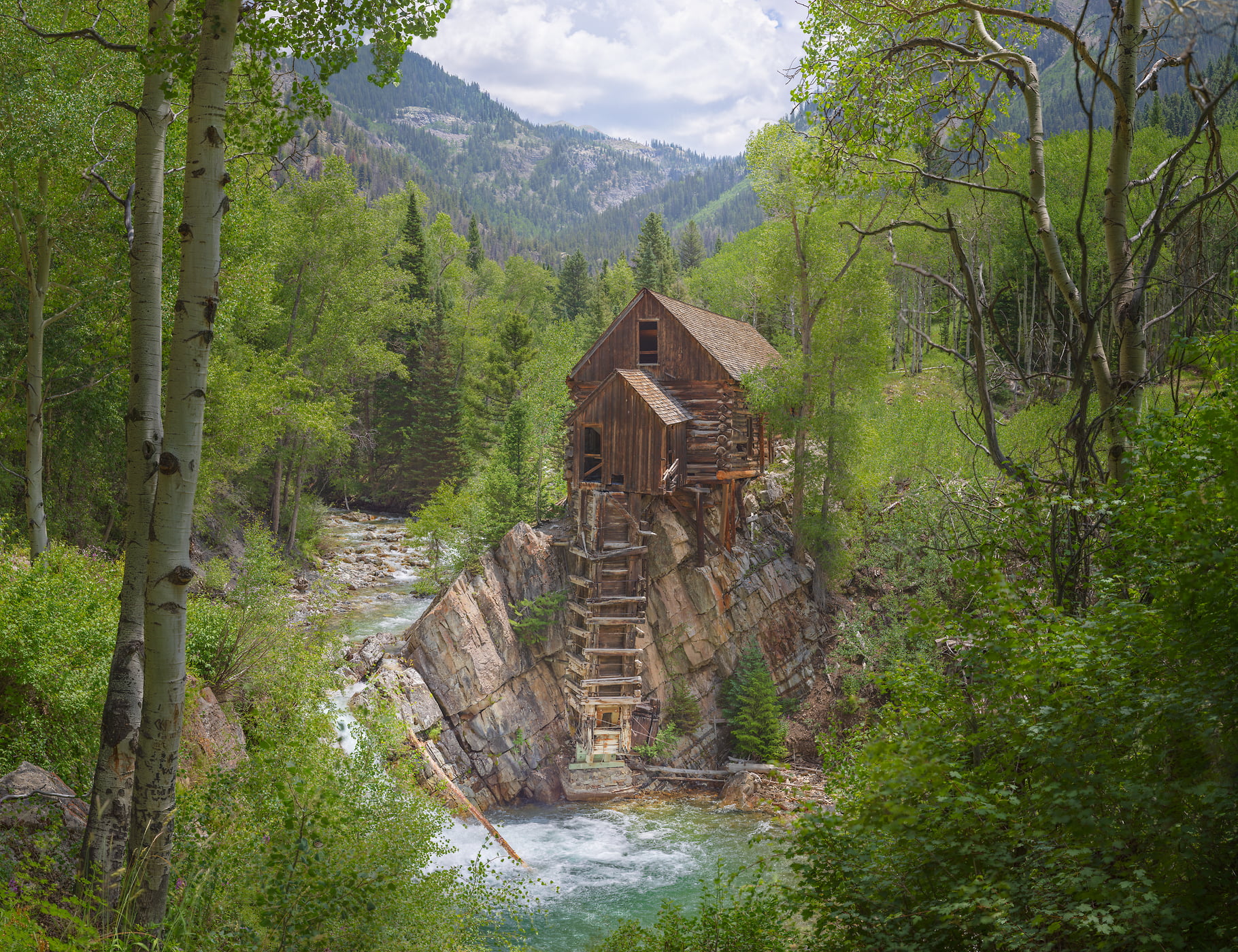 2,498 megapixels! A very high resolution, large-format VAST photo print of a rustic mill next to a stream in the woods; nature photograph created by John Freeman in Crystal Colorado.