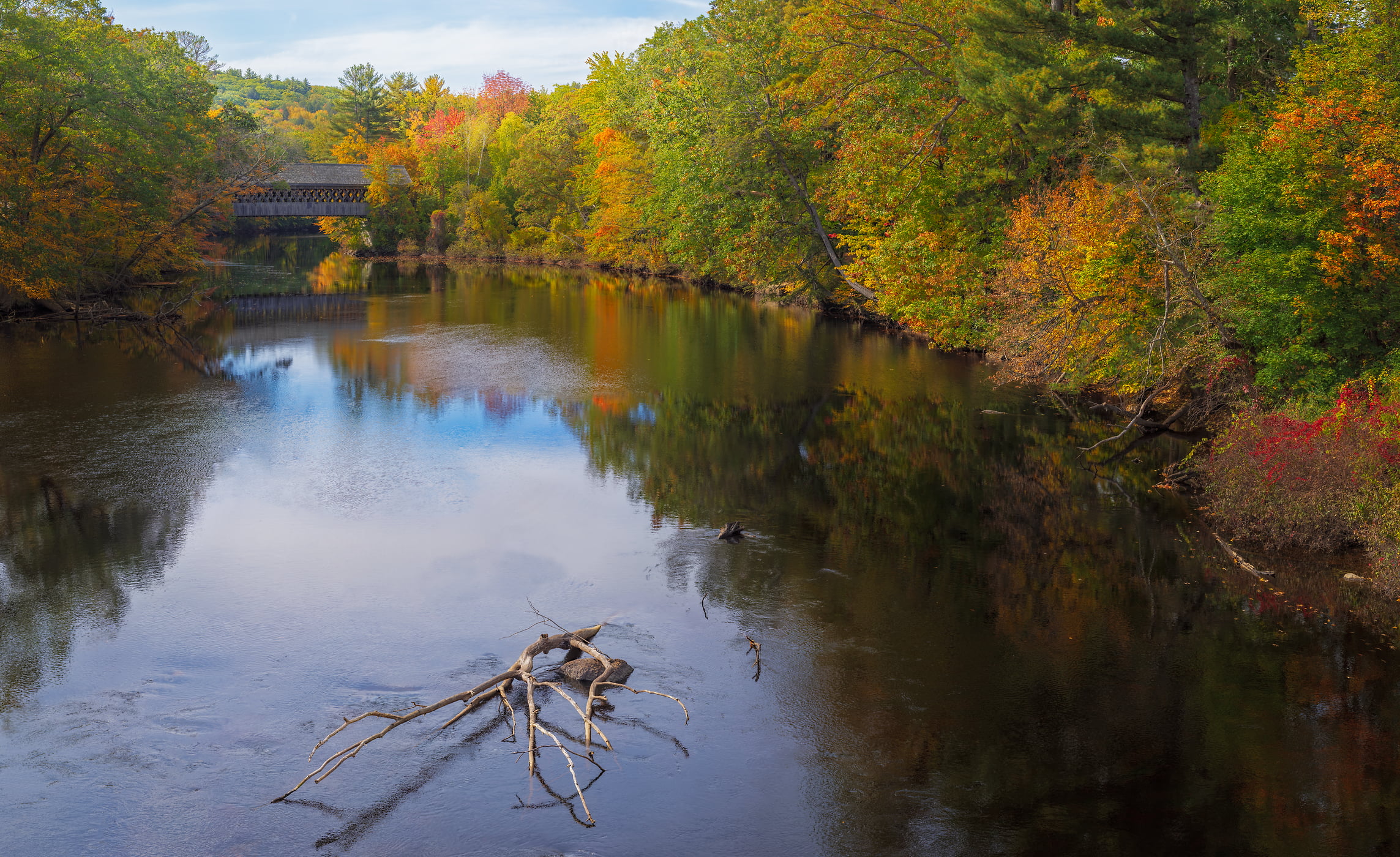 2,286 megapixels! A very high resolution, large-format VAST photo print of a covered bridge in New England in autumn; photograph created by John Freeman in Bridge Street, Henniker, New Hampshire.