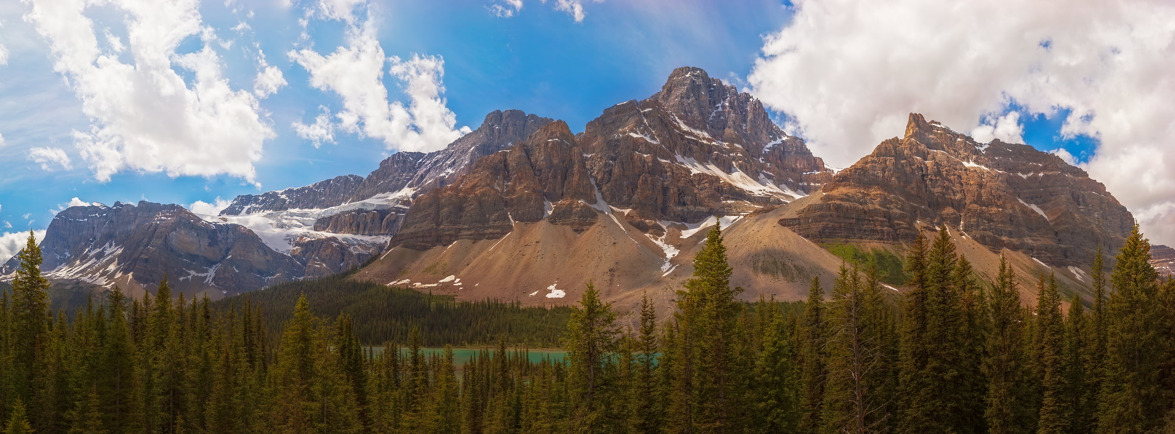 2,246 megapixels! A very high resolution, landscape wallpaper photo of a mountain range; photograph created by John Freeman in Banff National Park, Alberta, Canada.