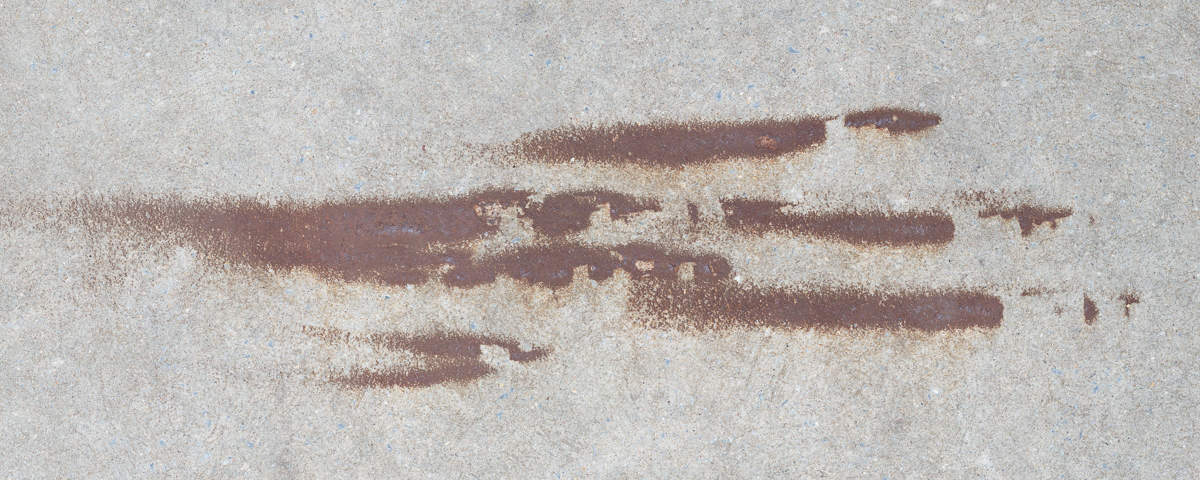 771 megapixels! A very high resolution, large-format VAST photo print of rust stains on sidewalks; fine art photograph created by Dan Piech in Manhattan, New York City.