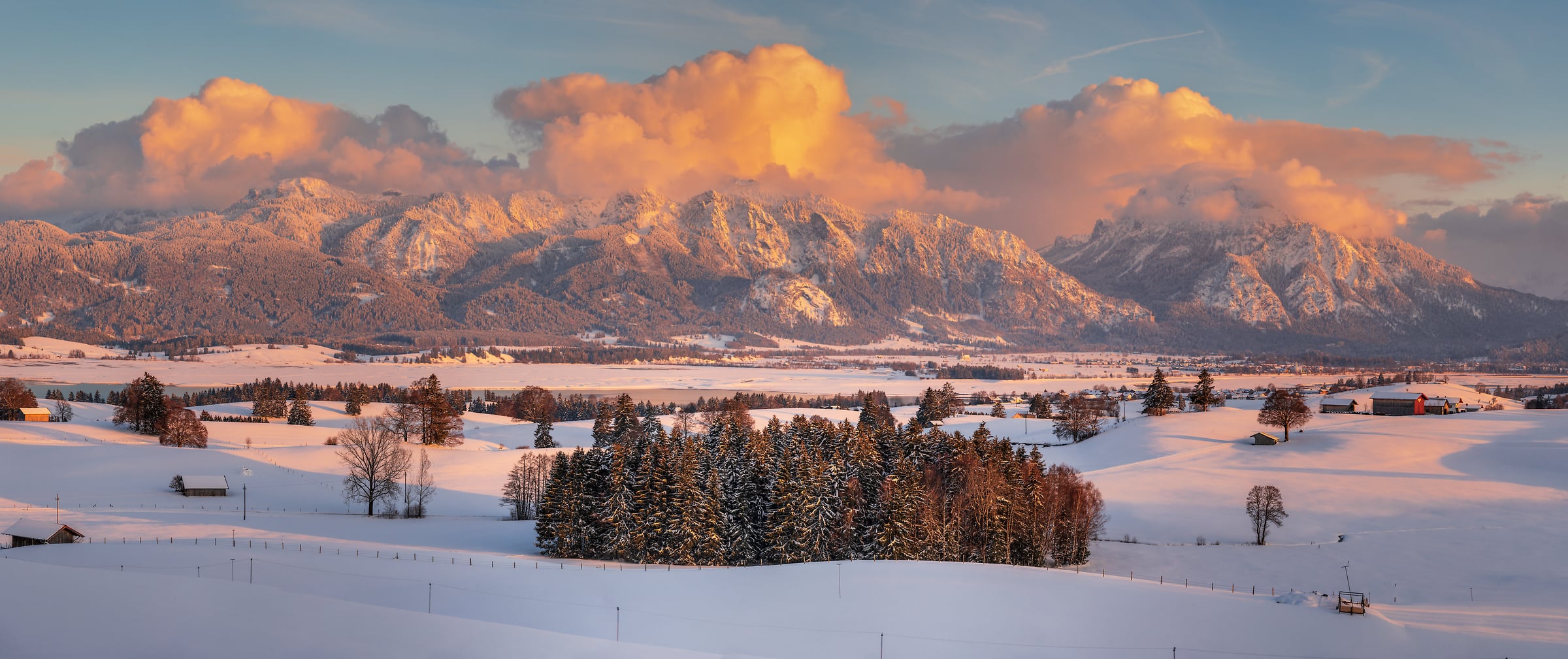 797 megapixels! A very high resolution, large-format VAST photo print of scenic winter landscape with mountains and snowy farm fields at sunset; photograph created by Alfred Feil in Füssen, Bavaria, Germany.