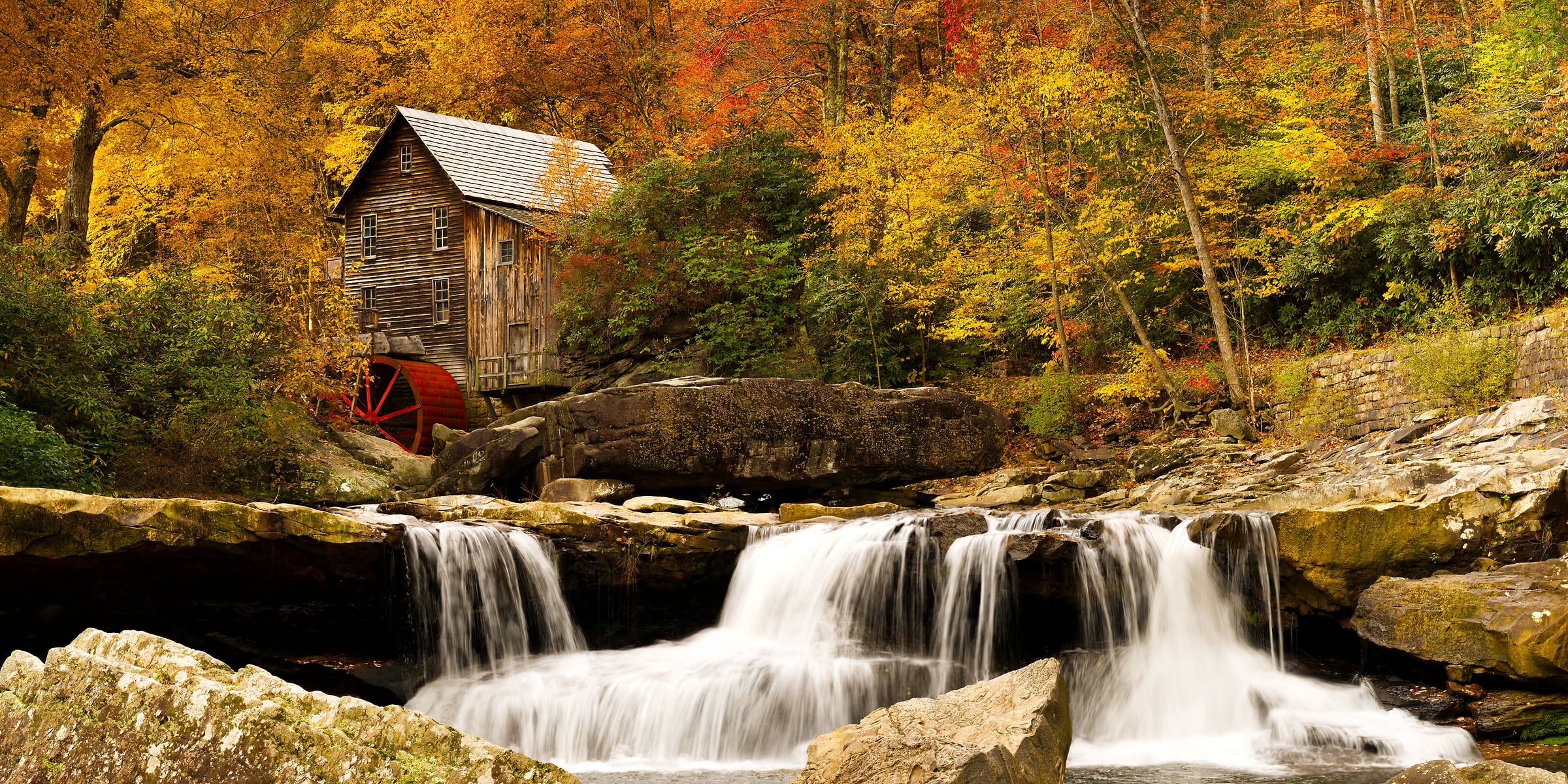 441 megapixels! A very high resolution, large-format VAST photo print of an autumn scene with fall foliage, a watermill, a forest, and waterfalls; landscape nature photograph created by David David at Glade Creek Grist Mill in Babcock State Park, West Virginia.