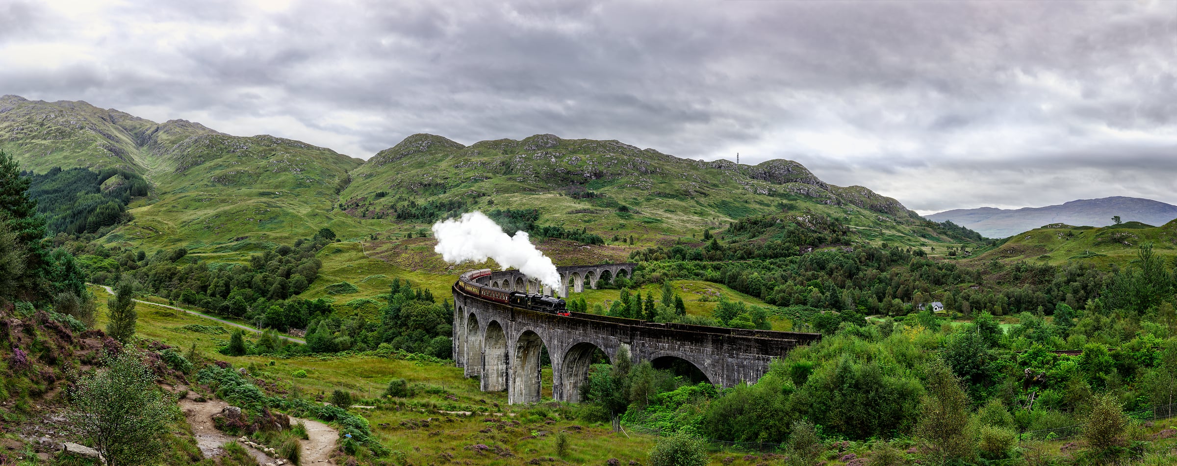 2,691 megapixels! A very high resolution, large-format VAST photo print of the Jacobite railroad train steam locomotive going across the Glenfinnan Viaduct bridge; landscape wall mural photograph created by Scott Dimond in Glenfinnan Viaduct, United Kingdom.