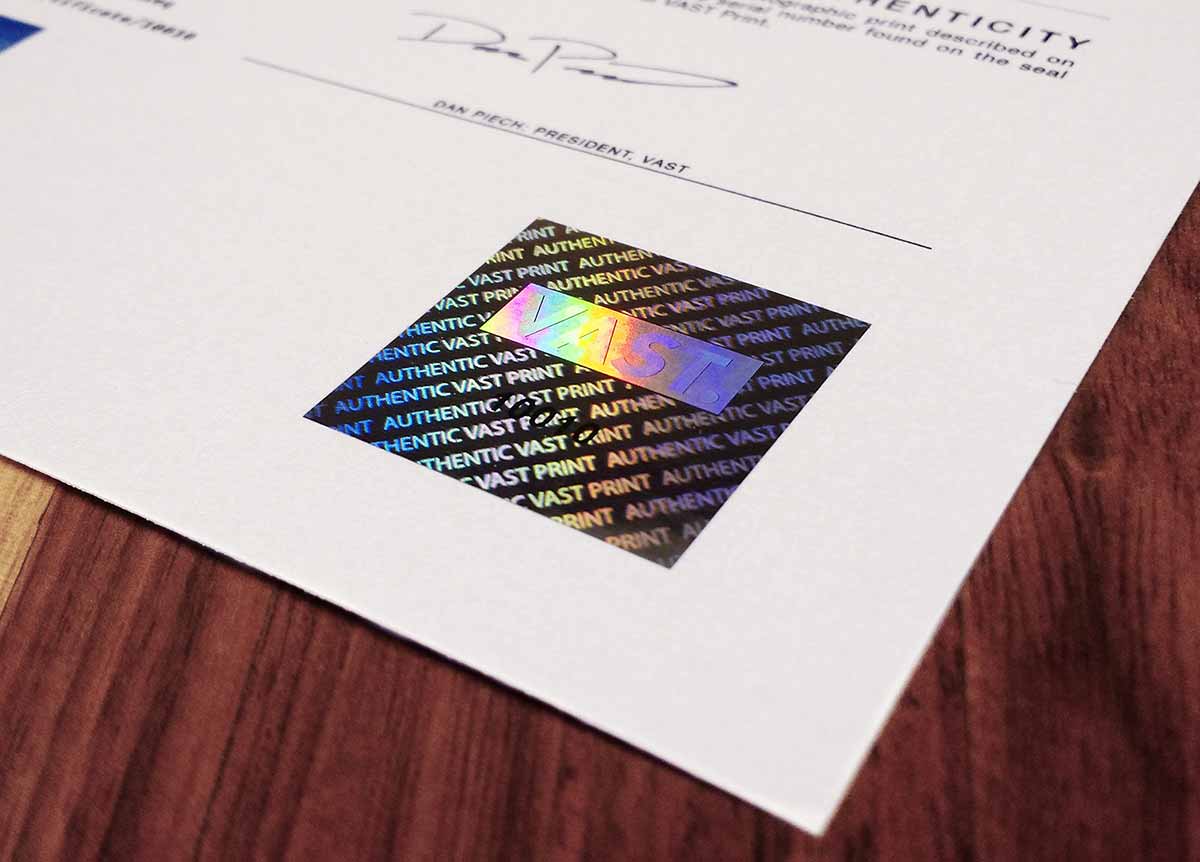 A hologram seal on a VAST certificate of authenticity