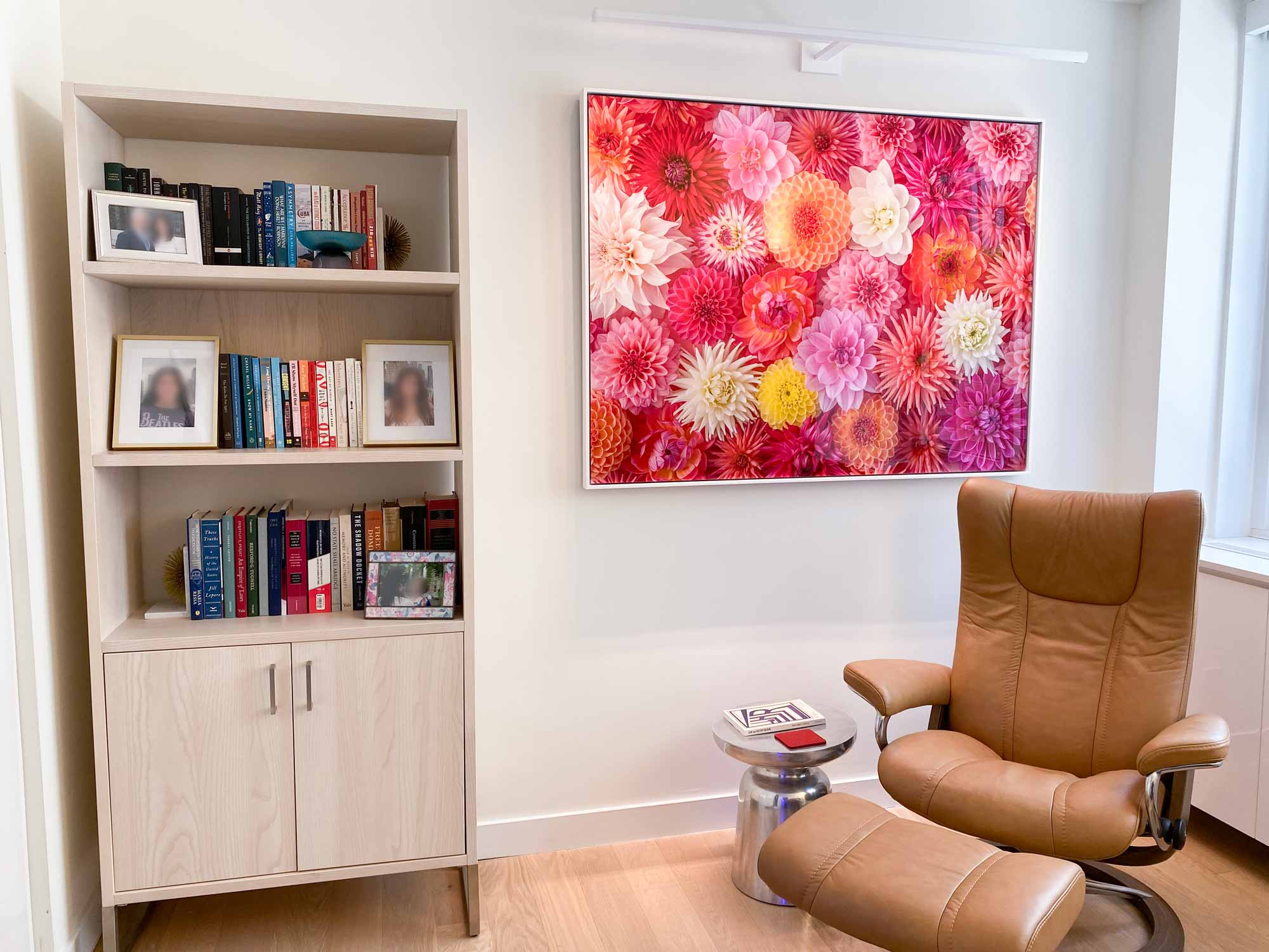 An utlra-high-resolution, framed VAST Print of a flower photo hanging on a wall.