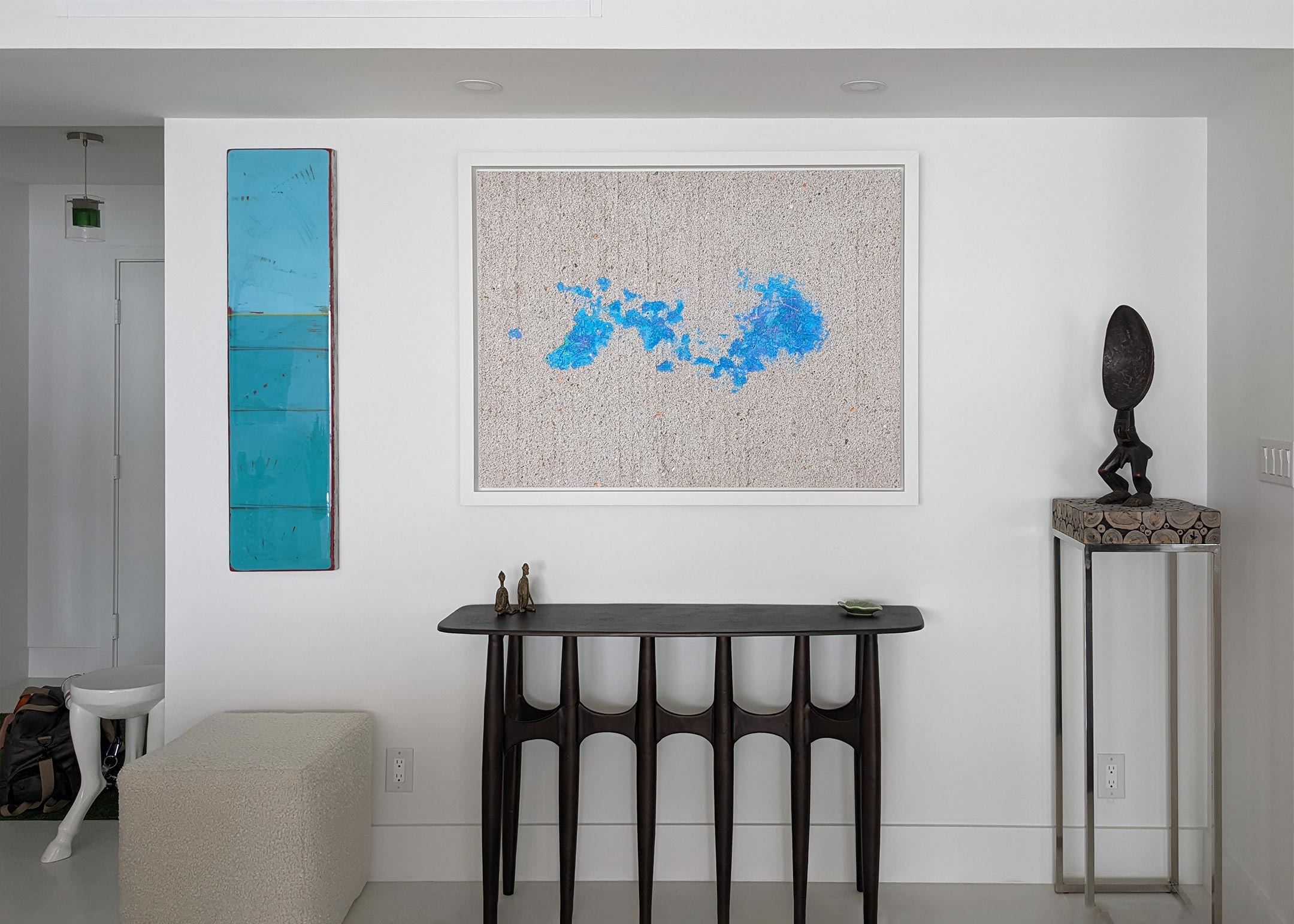 A picture of a framed VAST photo from Dan Piech's Concrete Canvas series hanging on a wall.