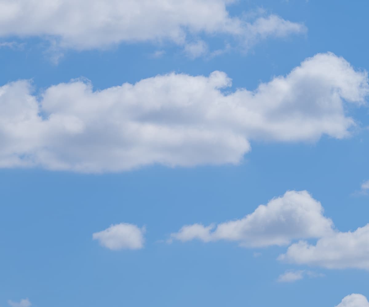 512 megapixels! A very high resolution, panorama photo of a beautiful blue sky with idyllic, puffy white clouds; stock photograph created by Assaf Frank; available to be licensed and downloaded.