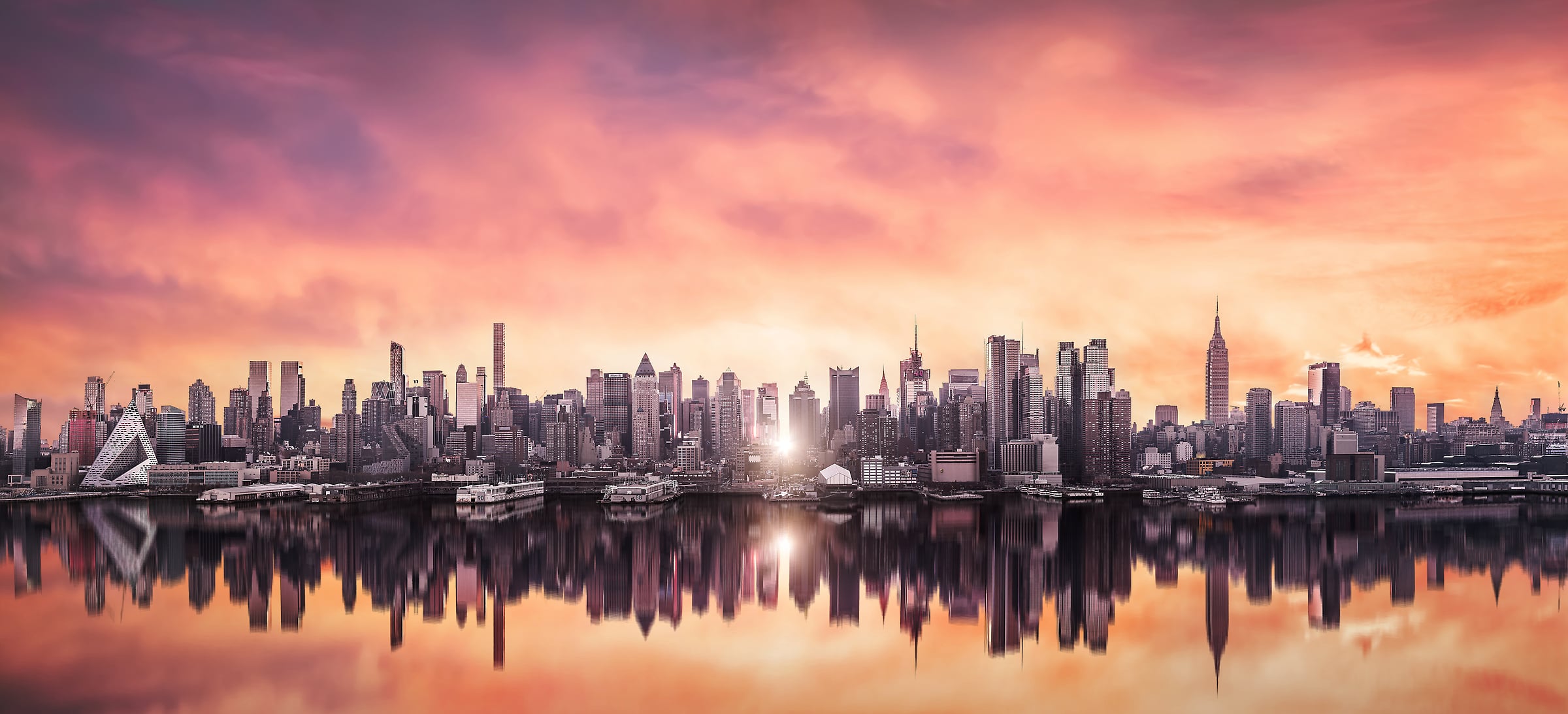 672 megapixels! A very high definition cityscape VAST photo of Manhattanhenge sunrise among the Midtown Manhattan city skyline skyscrapers; created in New York City by Dan Piech.