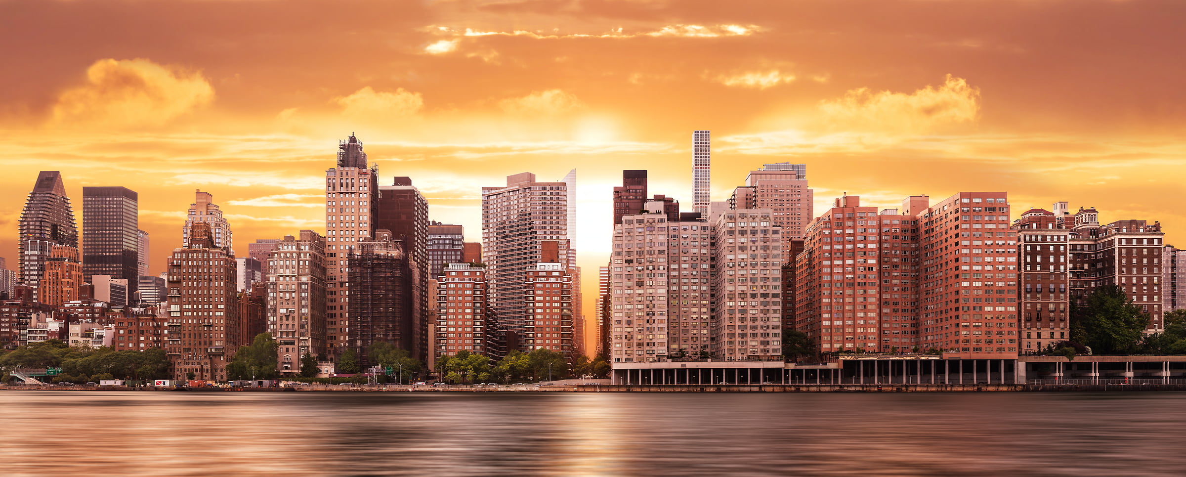 981 megapixels! A very high definition cityscape VAST photo of the Midtown East Manhattan city skyline and East River during a beautiful sunset in New York City; created by Dan Piech.