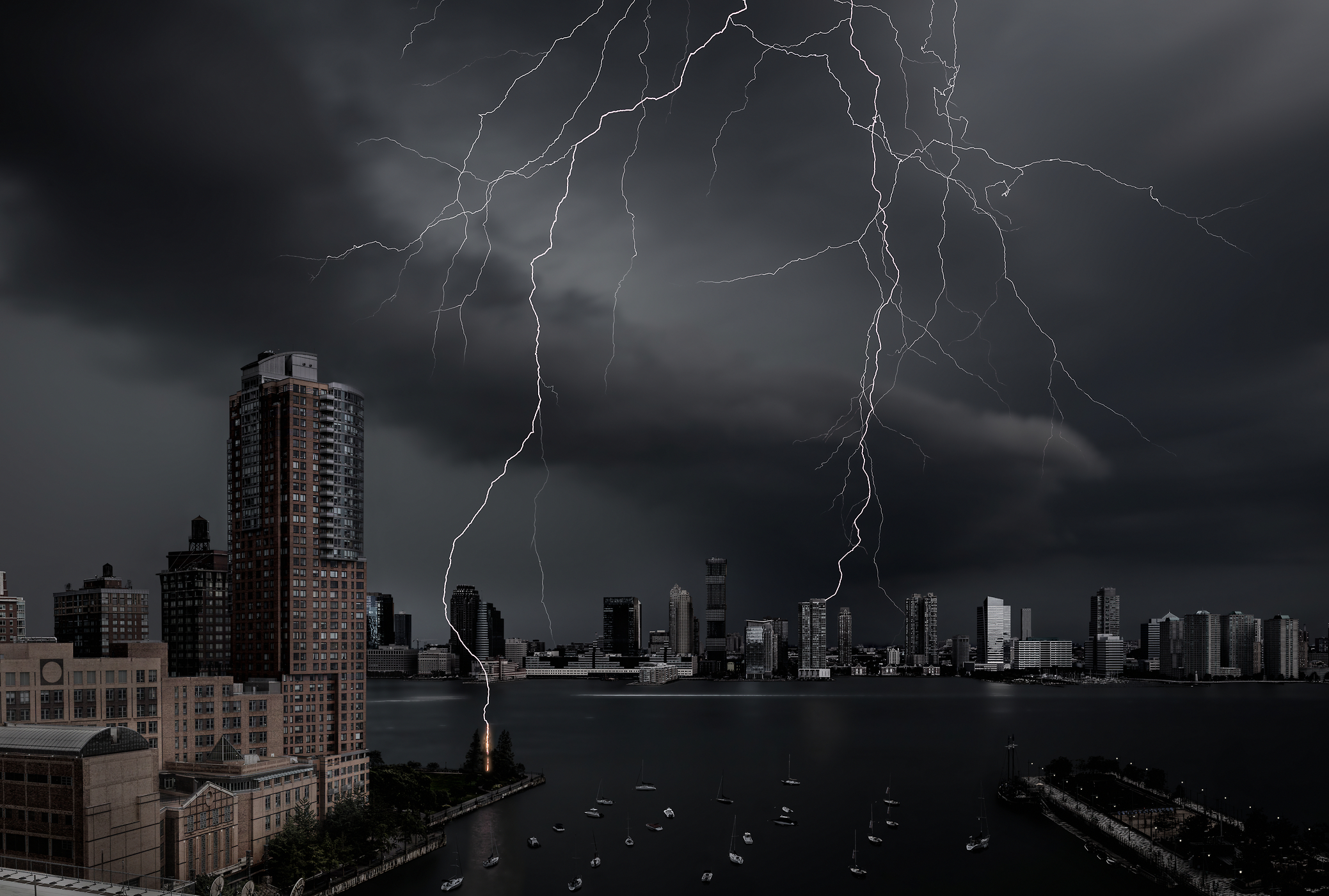 5,449 megapixels! The highest definition VAST photo of a lightning bolt strike from a thunderstorm over the Hudson River and Tribeca Pointe in the Battery Park City neighborhood of New York City; created by Dan Piech.