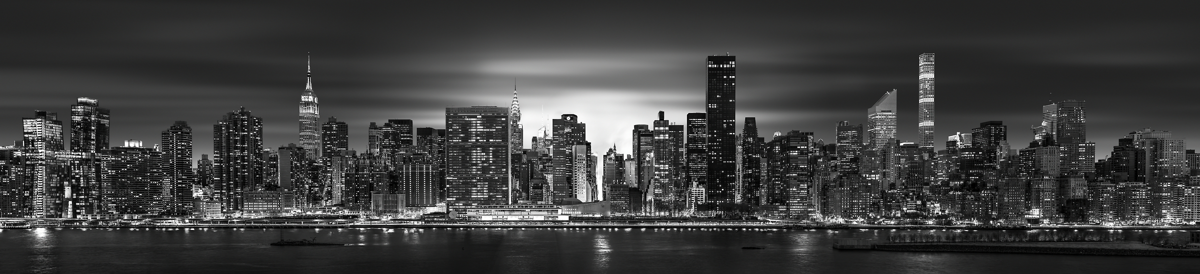 6,410 megapixels! A very high resolution, large-format VAST photo print of the NYC skyline at night with the East River; cityscape photo created by Dan Piech
