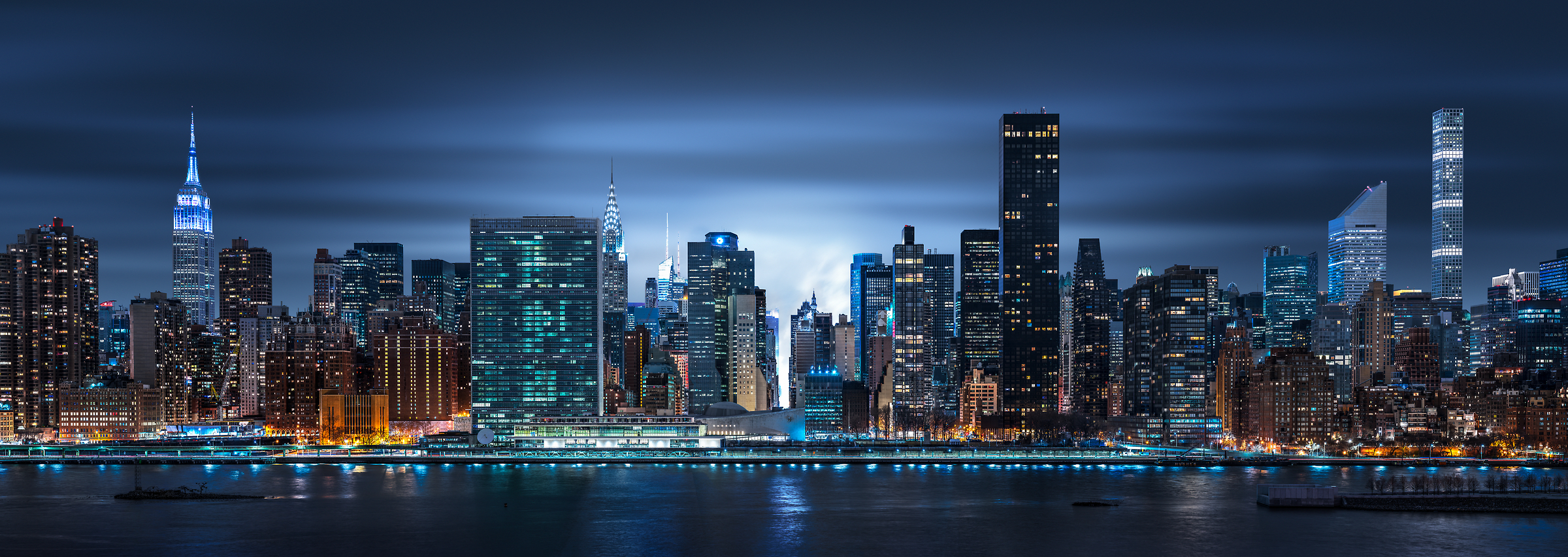 4,122 megapixels! A very high resolution, large-format VAST photo print of the NYC skyline at night with the East River; cityscape photo created by Dan Piech.