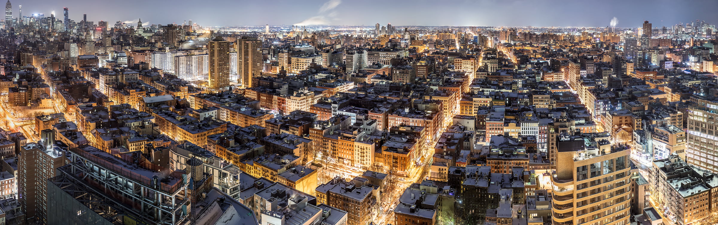 1,051 megapixels! A very high resolution, large-format VAST photo print of the SoHo skyline in NYC in winter snow at night; cityscape fine art photo created by Dan Piech in New York City.