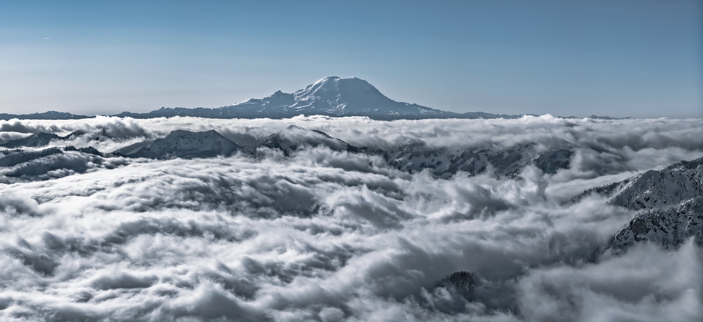 169 megapixels! A very high resolution, large-format VAST photo print of Mount Rainier and the Cascade Mountains among clouds; fine art landscape photo created by Scott Rinckenberger from Snoqualmie Mountain in Washington, USA