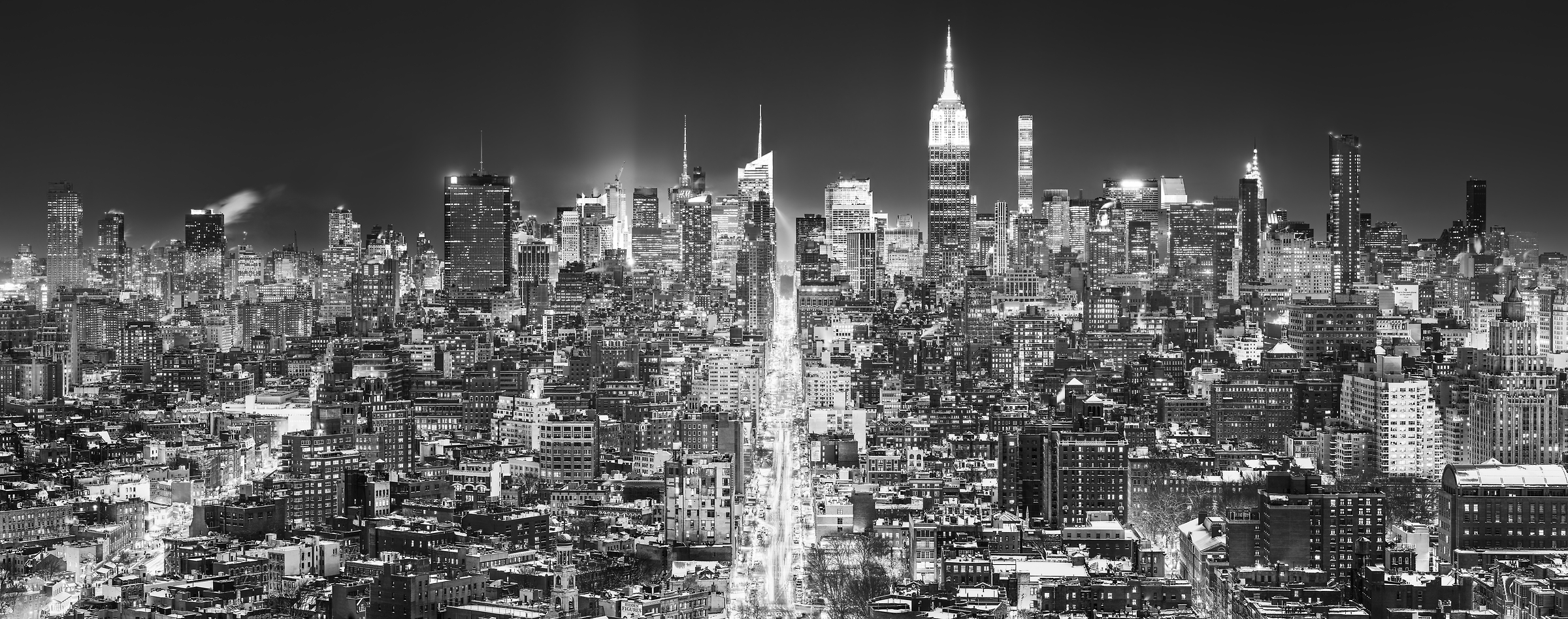 2,002 megapixels! A very high resolution, large-format VAST photo print of the Manhattan NYC skyline in winter snow at night; black and white cityscape fine art photo created by Dan Piech in New York City.