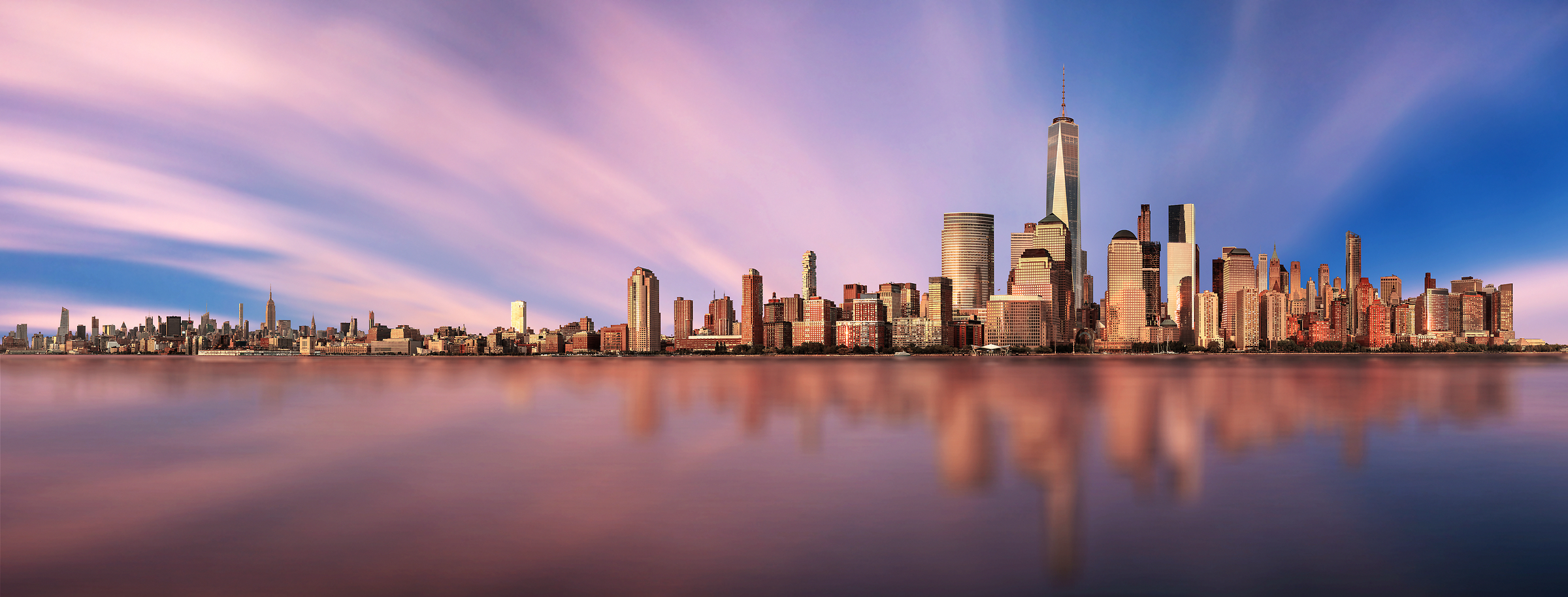 7,070 megapixels! An incredibly high resolution gigapanorama photo of sunset and the New York City skyline; cityscape fine art print created by Chris Collacott in Manhattan, NYC