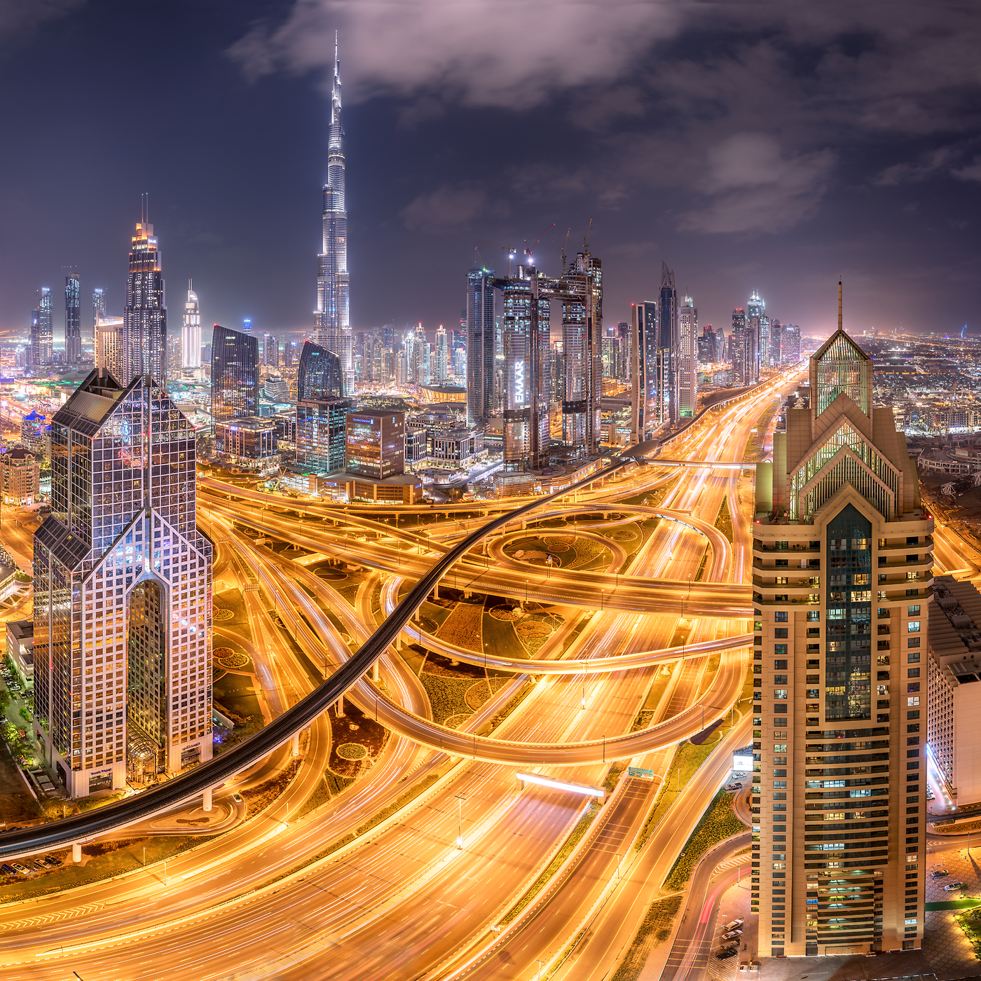 378 megapixels! A very high resolution, large-format nighttime photo of the Dubai skyline and highways with the Burj Khalifa; fine art cityscape photograph created by Tim Shields in the United Arab Emirates