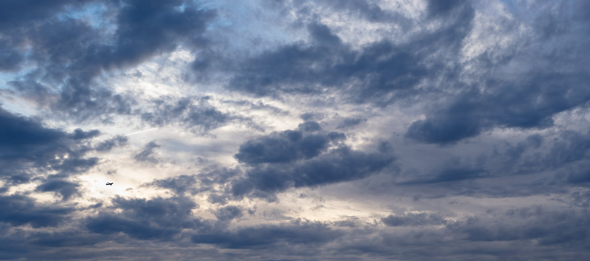 485 megapixels! A very high resolution, large-format VAST photo artwork of an airplane taking off backdropped by a beautiful sunset; fine art airplane photograph created by Dan Piech in New York City.
