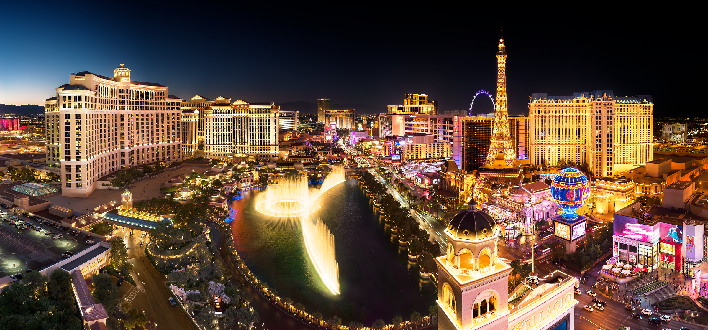 765 megapixels! A very high resolution, large-format VAST photo of the Las Vegas Strip skyline at night with the Fountains of Bellagio and casinos including Paris, Ceasars Palace, The Venetian; skyline photograph created by Jim Tarpo in Las Vegas, Nevada