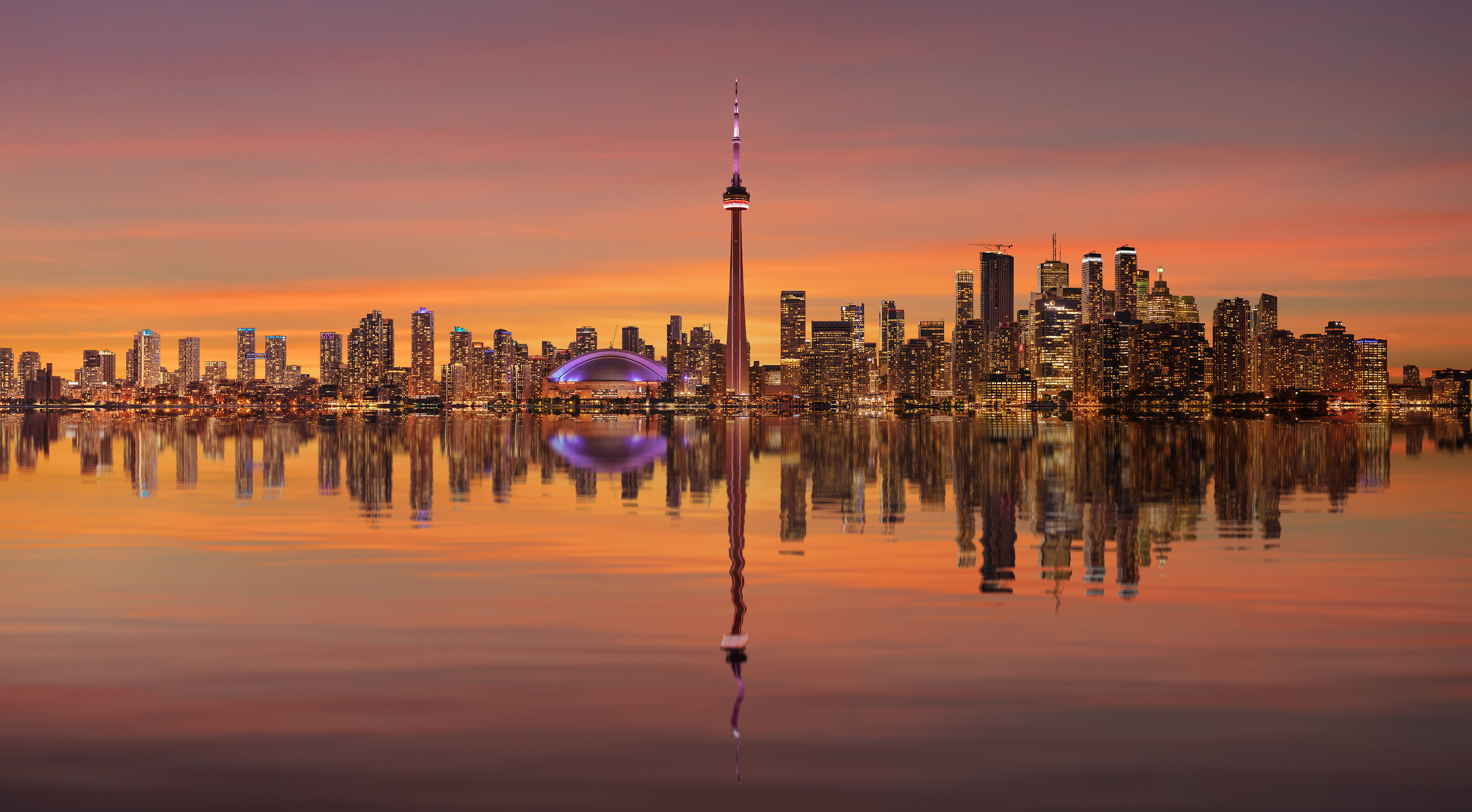 3,204 megapixels! A very high resolution, large-format VAST photo print of the Toronto skyline at sunset with a reflection in Lake Ontario; cityscape photograph created by Chris Collacott in Toronto, Ontario, Canada.