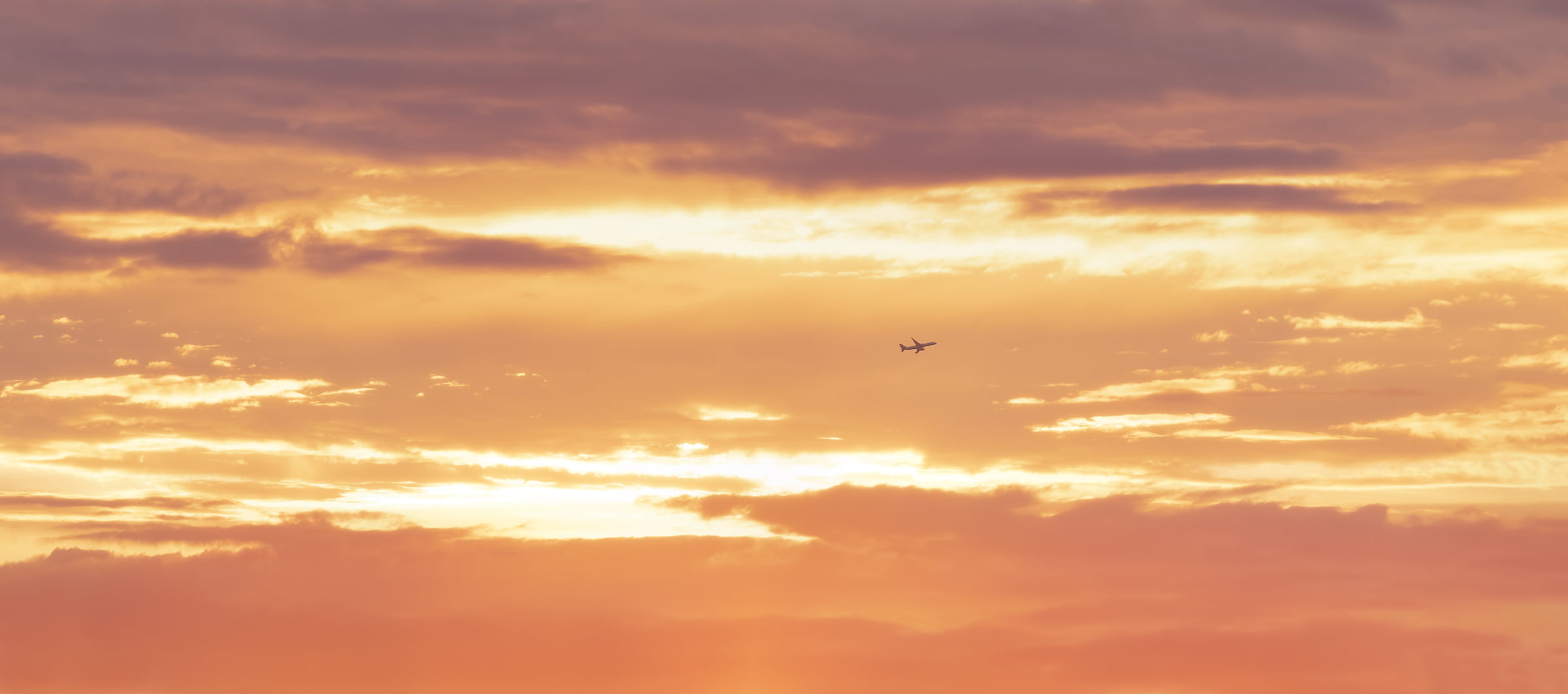 328 megapixels! A very high resolution, large-format VAST photo print of a plane backdropped by a beautiful sunset; photograph created by Dan Piech in New York City