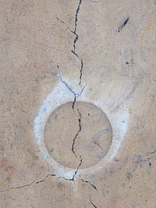 A very high resolution, large-format VAST photo print of a sidewalk with a crack; artistic photograph created by Dan Piech in Manhattan, New York City.