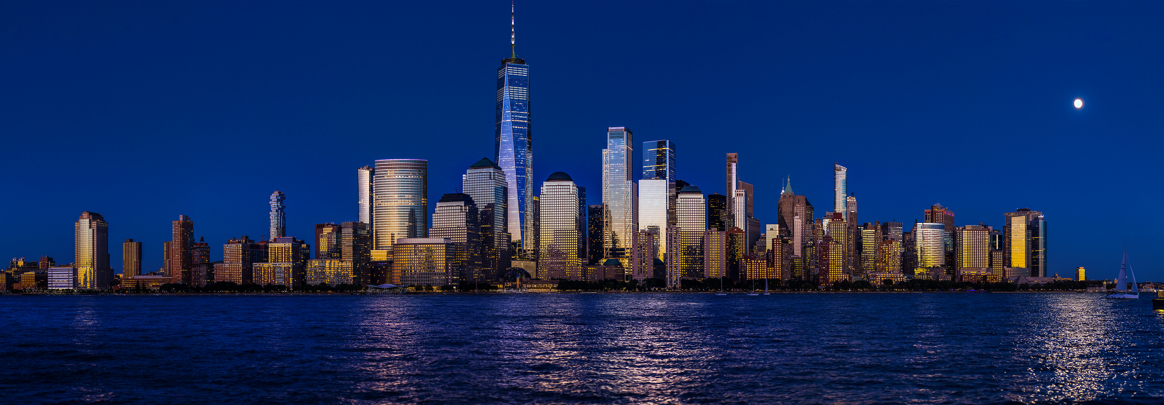 323 megapixels! A very high resolution, large-format VAST photo print of the Lower Manhattan skyline at sunset with a dark blue sky; cityscape photograph created by Beyti Barbaros in Lower Manhattan, New York City, New York