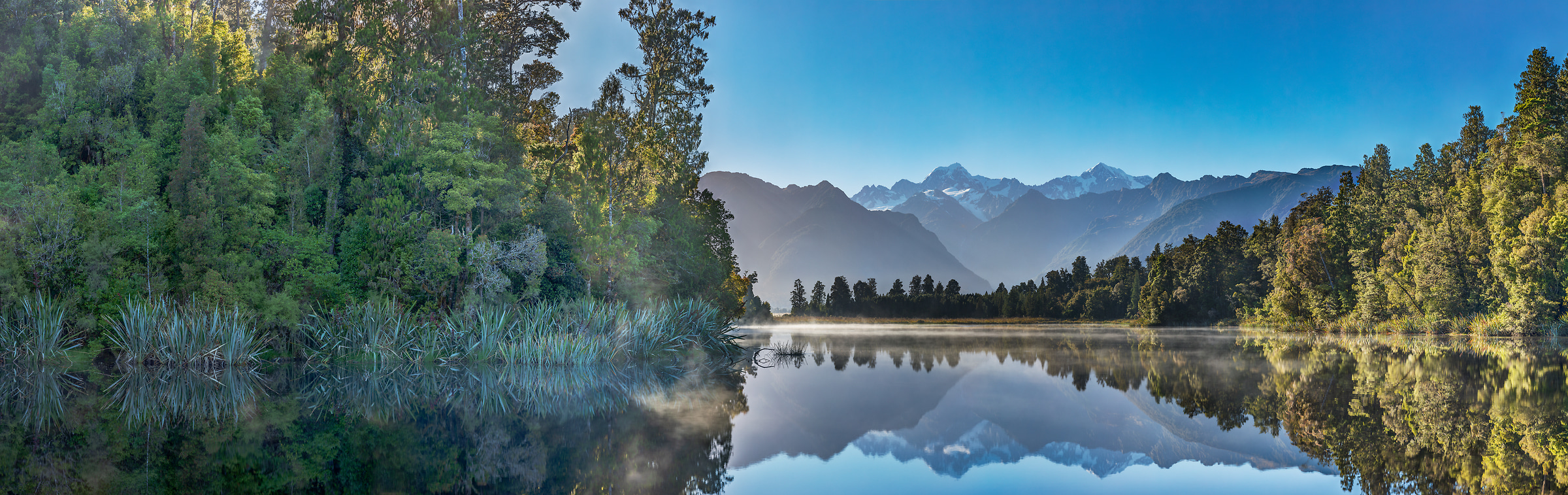 1,727 megapixels! A very high resolution, large-format VAST photo print of a lake in front of a mountain range; landscape photograph created by John Freeman in Lake Matheson, South Island, New Zealand