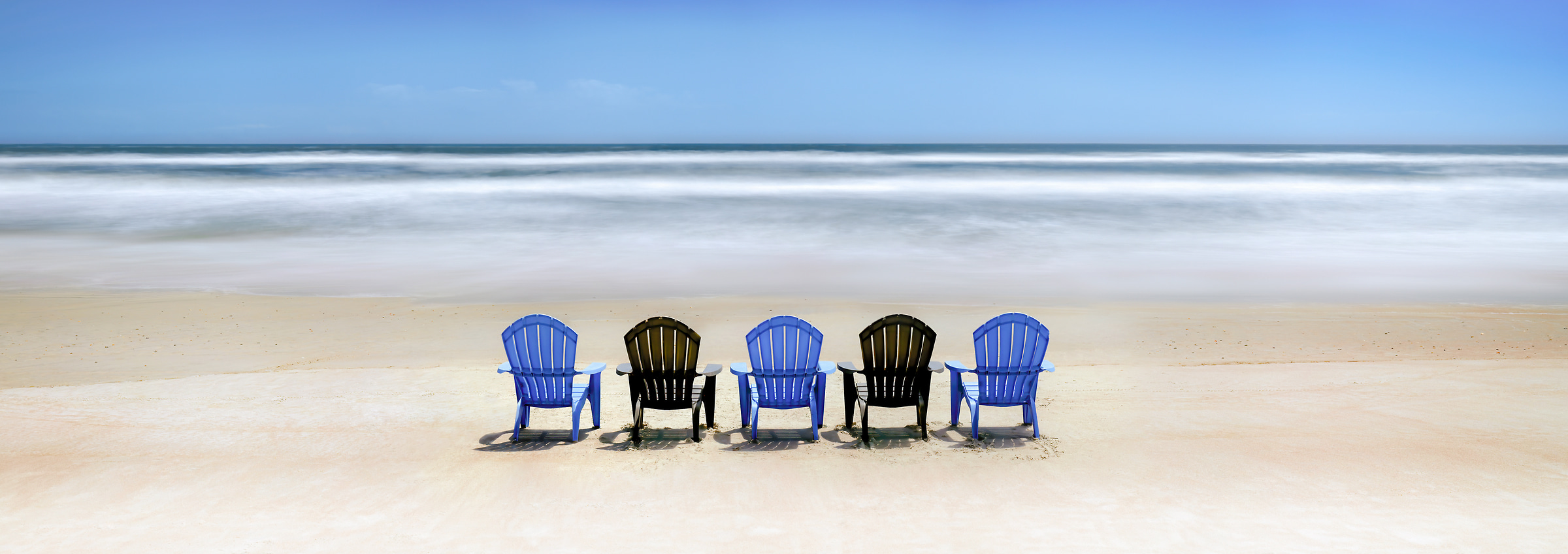 236 megapixels! A very high resolution, large-format VAST photo print of beach chairs on the sand; photograph created by Phil Crawshay in Vilano Beach, St Augustine, Florida