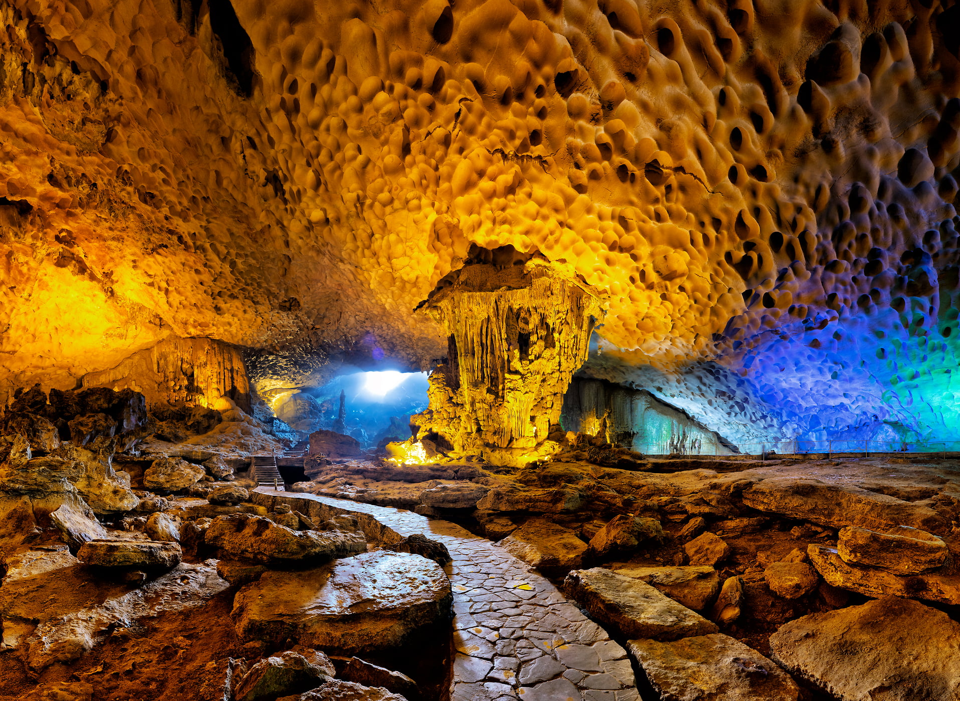 367 megapixels! A very high resolution, wallpaper photo of a walkway in a cave; photograph created by Peter Rodger in Sung Sot Cave, Ha Long Bay, Vietnam.