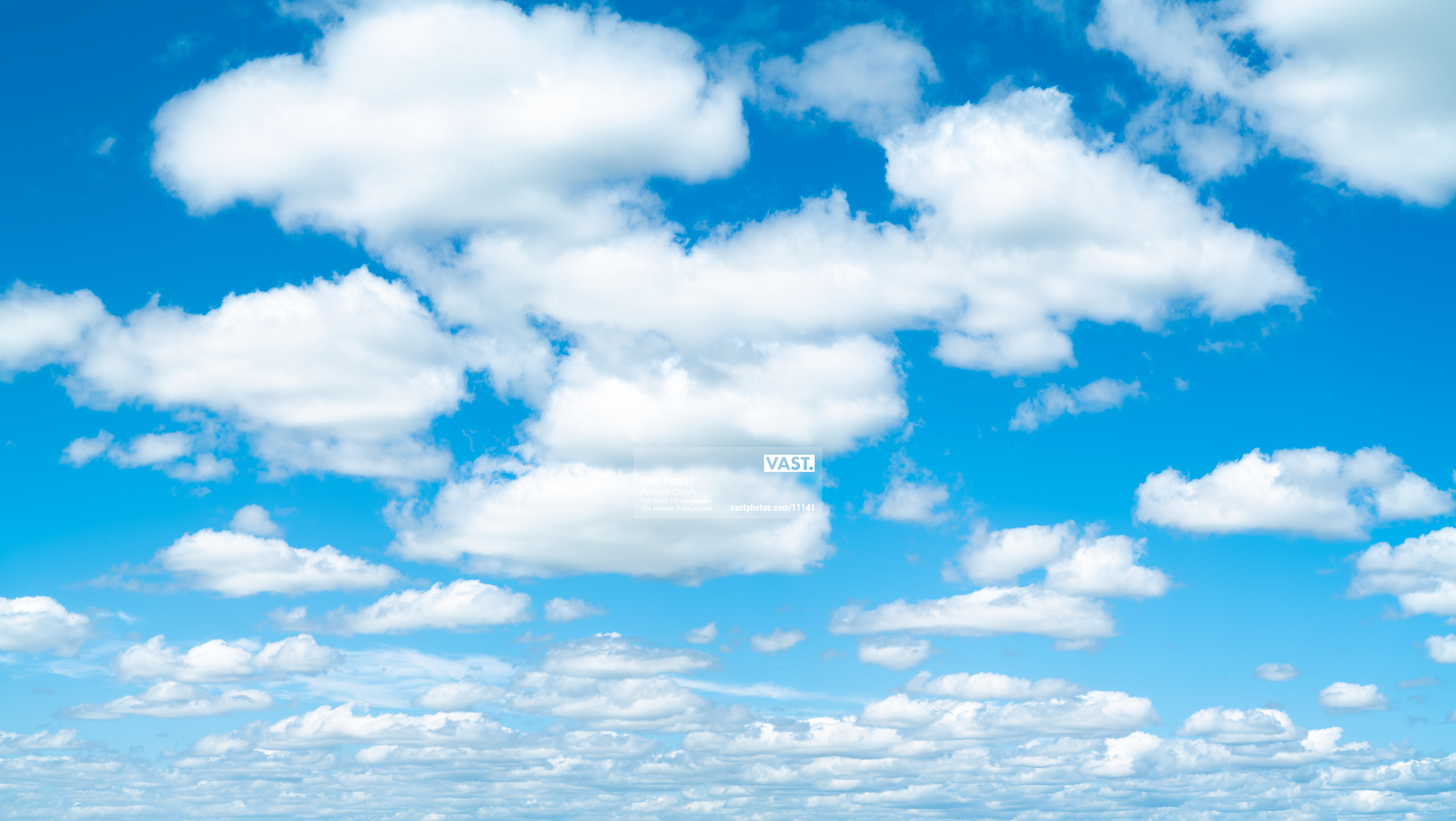 Fluffy White Clouds In A Blue Sky by Emrah Turudu