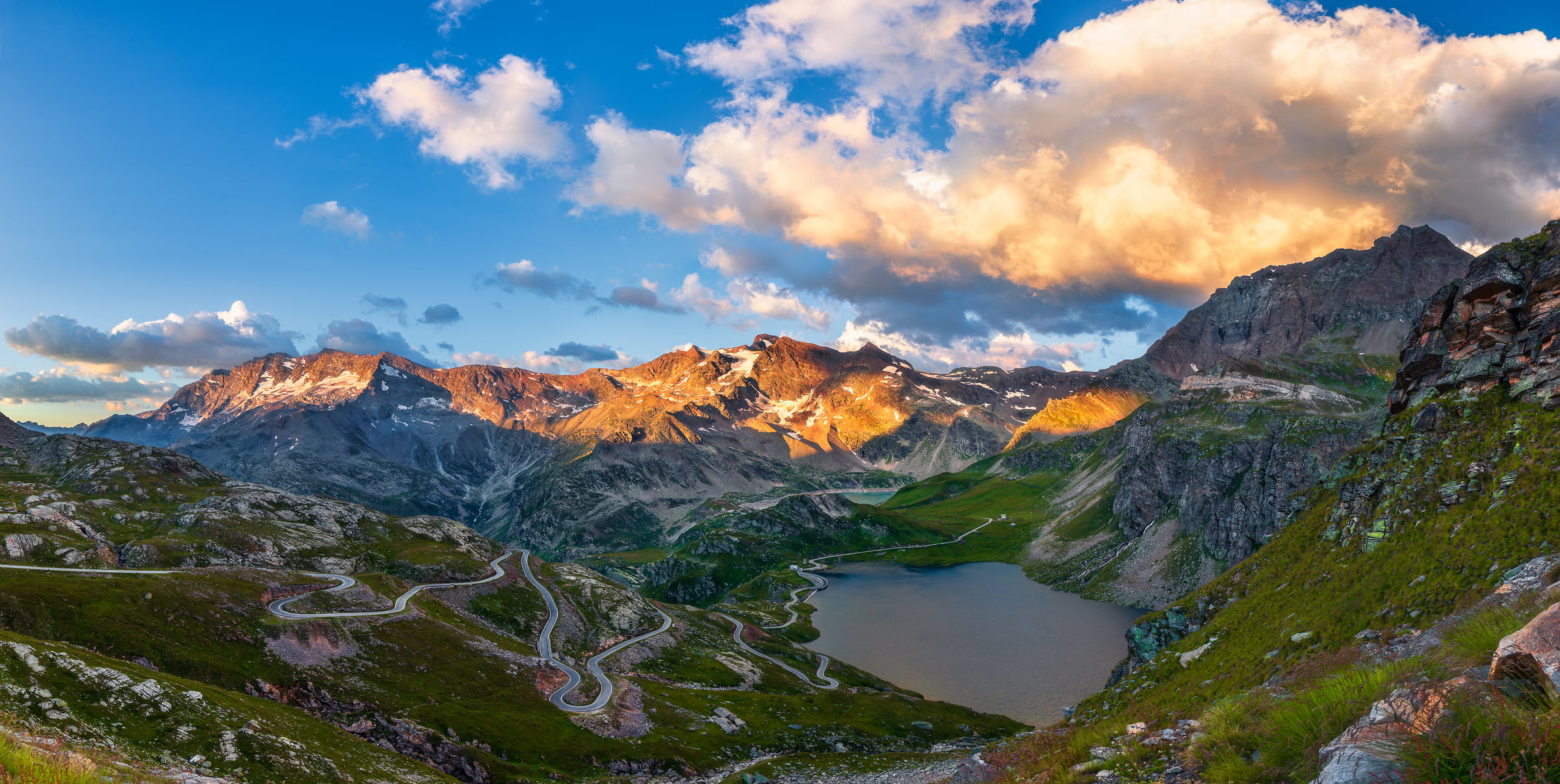 140 megapixels! A very high resolution, large-format VAST photo print of a heavenly landscape with mountains, a lake, a road, and clouds at sunset; photograph created by Duilio Fiorille in Gran Paradiso National Park, Ceresole Reale, Piedmont, Italy