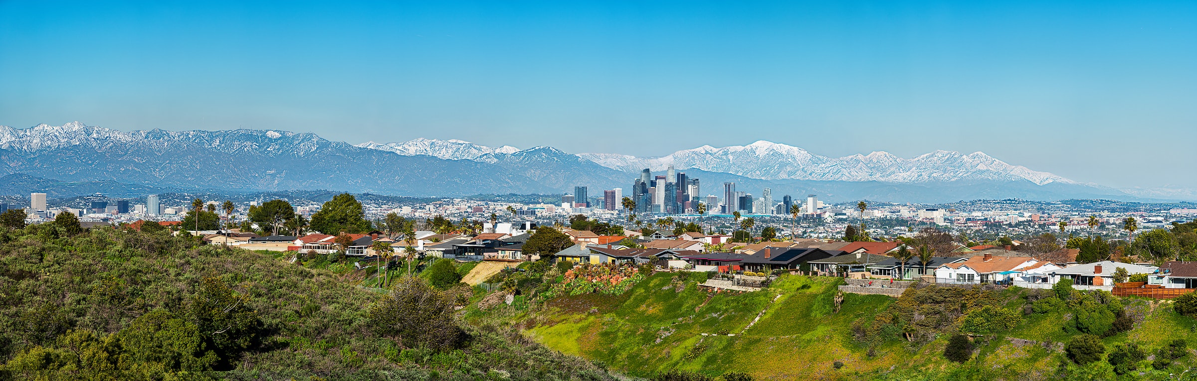 129 megapixels! A very high resolution, large-format VAST photo print of the Los Angeles skyline with snow on the mountains in the background; landscape photograph created by Jim Tarpo in Ladera Heights, California.