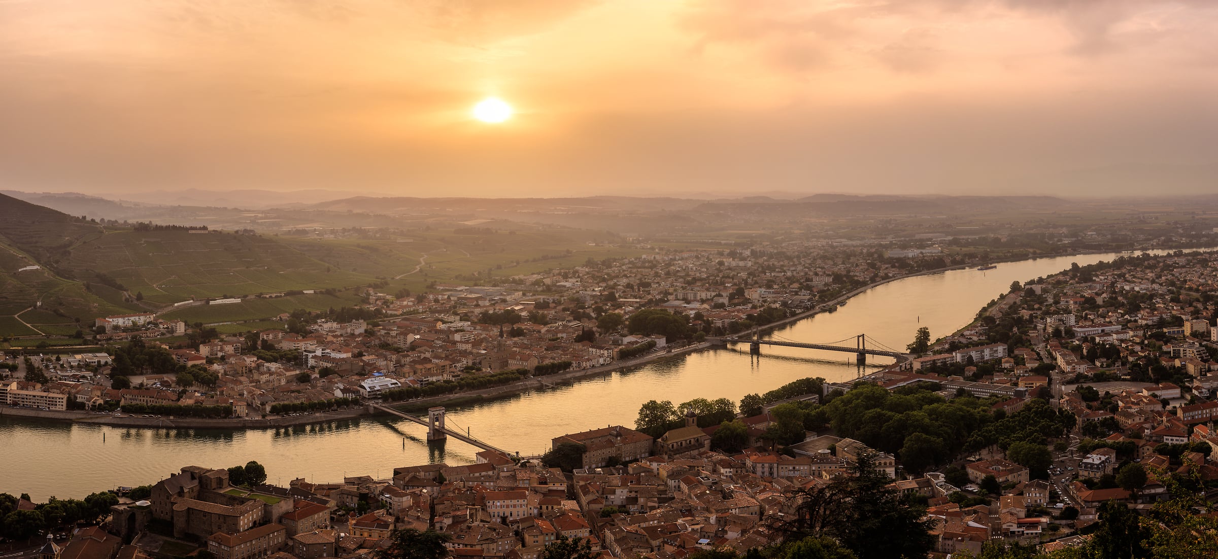 381 megapixels! A very high resolution, large-format VAST photo print of sunrise over the Rhône River with a town and bridges; photograph created by Scott Dimond in Tournon-sur-Rhône, France.