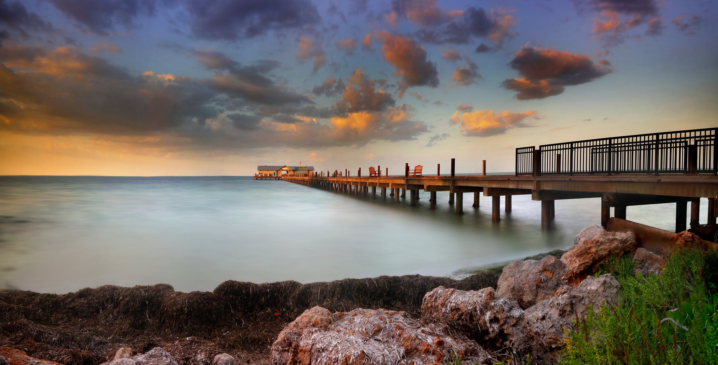 256 megapixels! A very high resolution, large-format VAST photo print of a pier going out into the water at sunset; photograph created by Phil Crawshay of City Pier in Bayfront Park, Anna Maria Island, Florida.